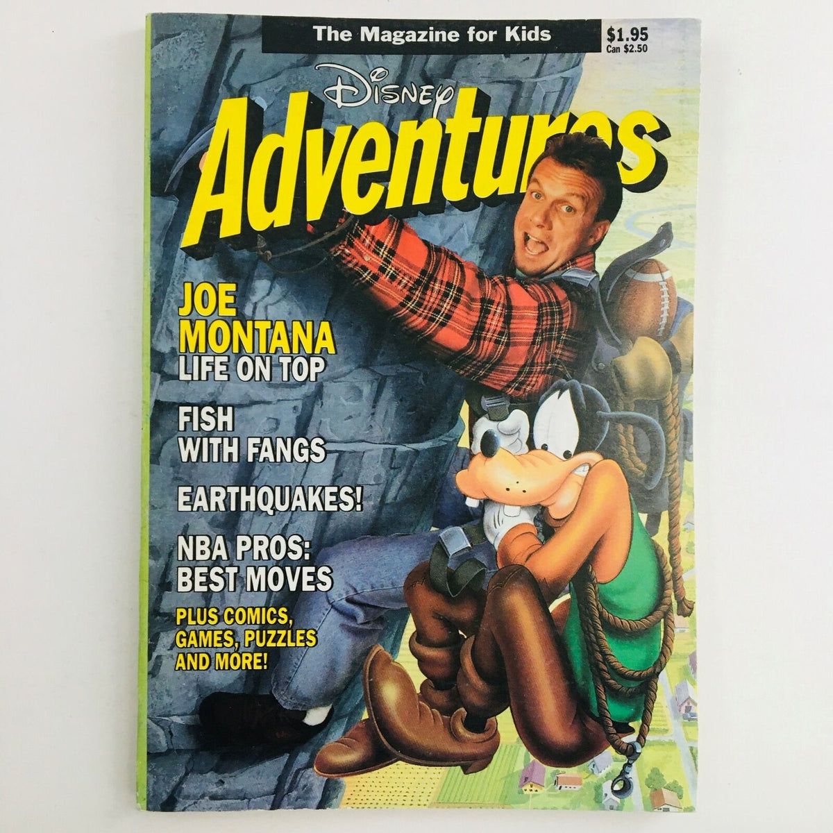 Disney Adventures Magazine May 1991 featuring Joe Montana and Goofy on the cover. The magazine showcases vibrant illustrations and themes related to life atop mountains, sports, and adventure. Highlights include articles about fish, earthquakes, and NBA pros, making it a nostalgic piece of early '90s pop culture.