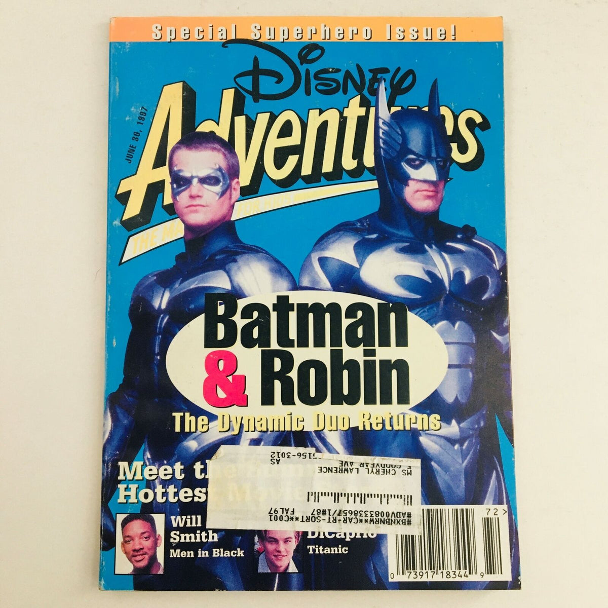 Cover of Disney Adventures Magazine June 1997 featuring Batman & Robin, highlighted as the Dynamic Duo Returns. The magazine also features Will Smith and Leonardo DiCaprio, making it a collectible piece of pop culture history.