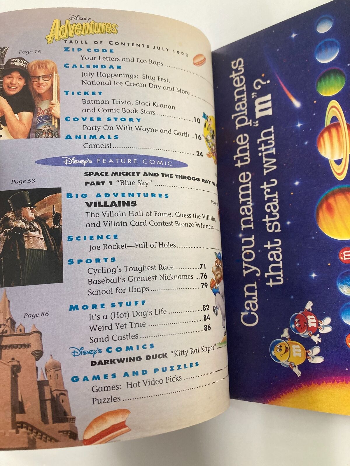 Inside page of Disney Adventures Magazine July 1992 displaying the table of contents, including sections on Batman Trivia and feature comics, alongside images of Wayne and Garth.