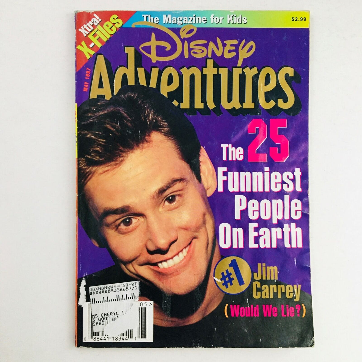Disney Adventures Magazine May 1997 cover featuring Jim Carrey, titled 'The 25 Funniest People On Earth #1 Jim Carrey (Would We Lie?)', showcasing vibrant colors and humorous imagery, ideal for vintage magazine collectors.