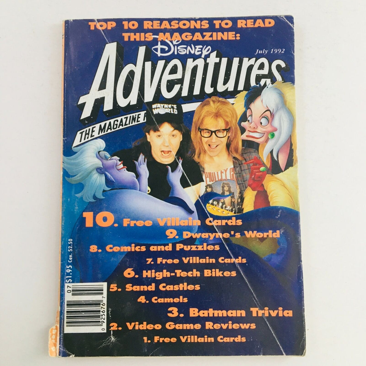 Disney Adventures Magazine July 1992 featuring Mike Myers and Dana Carvey on the cover, showcasing colorful graphics and promotional highlights including 'Top 10 Reasons to Read This Magazine'.
