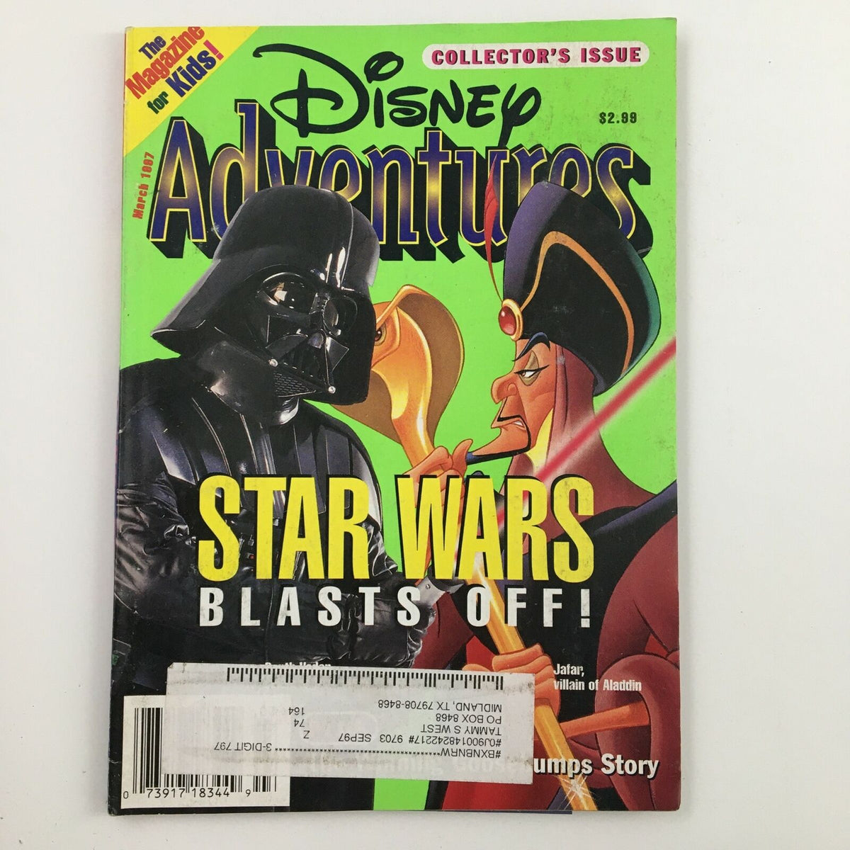 Disney Adventures Magazine March 1997 featuring Star Wars Blast Off and Aladdin's Jafar on the cover. The magazine highlights classic characters like Darth Vader and Jafar, making it a must-have collectible for Disney fans.