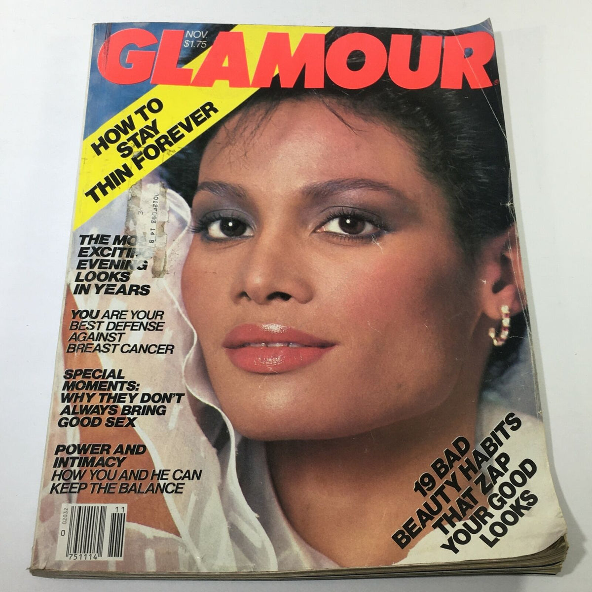 VTG Mademoiselle Magazine: November 1982 featuring a close-up of a model's face on the cover, showcasing 1980s fashion elegance and beauty trends.