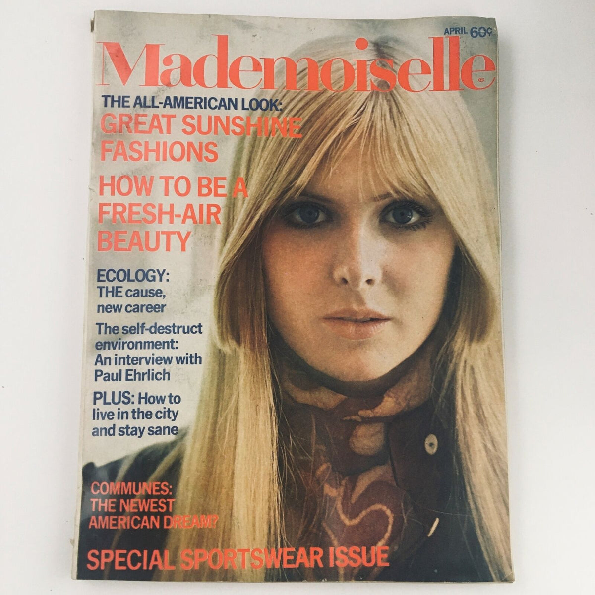 Cover of Mademoiselle Magazine April 1970 featuring an interview with Paul Ehrlich, showcasing 'The All-American Look' and topics on ecology, fashion, and beauty, with a model on the cover and vivid colors.