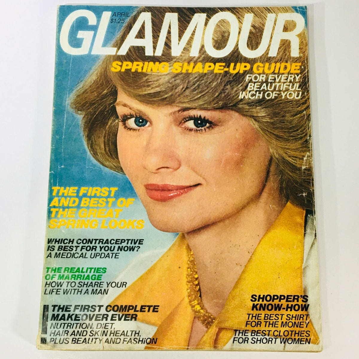 Vintage Glamour Magazine April 1977 cover featuring a beautiful model with short blonde hair, showcasing the Spring Shape-Up Guide, highlighting various spring looks and beauty tips. This collectible edition is a must-have for vintage magazine enthusiasts.