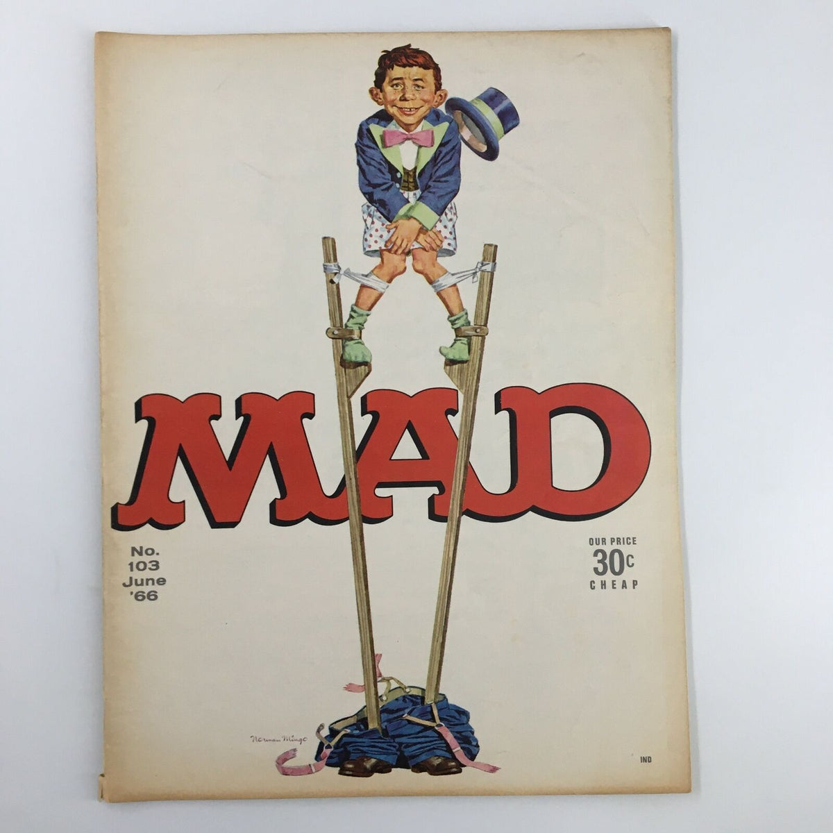 Cover of Mad Magazine June 1966 No. 103, featuring Alfred E. Neuman on stilts, reflecting the humor and culture of the 1960s.