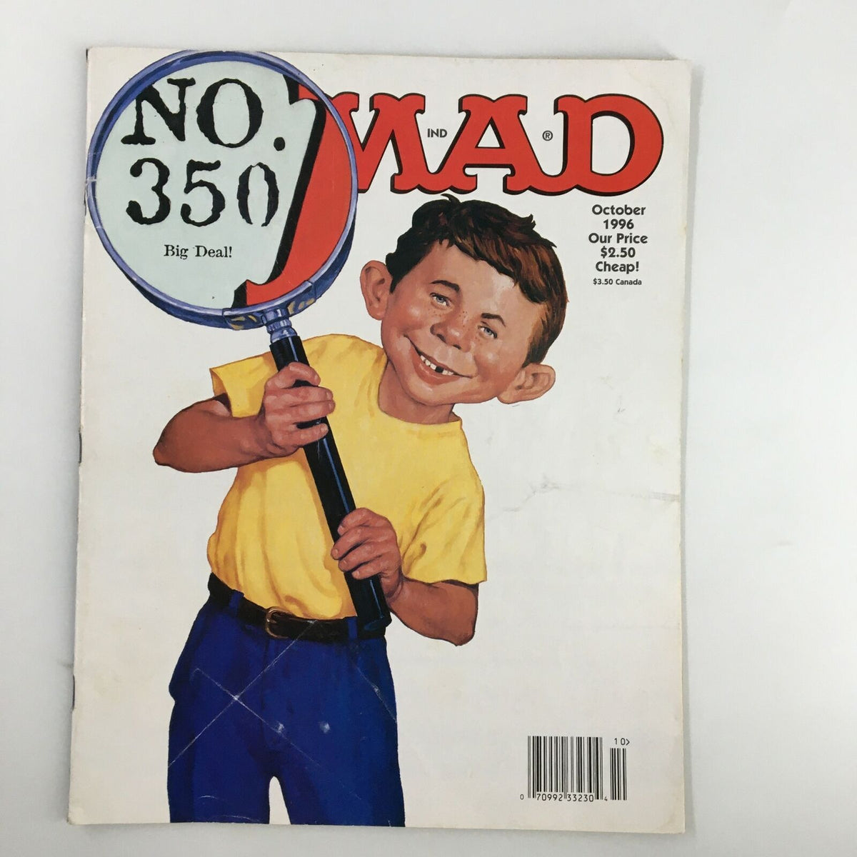 Cover of Mad Magazine October 1996 No. 350 featuring Neuman's Magnifying Glass illustration, highlighting classic humor and nostalgia.