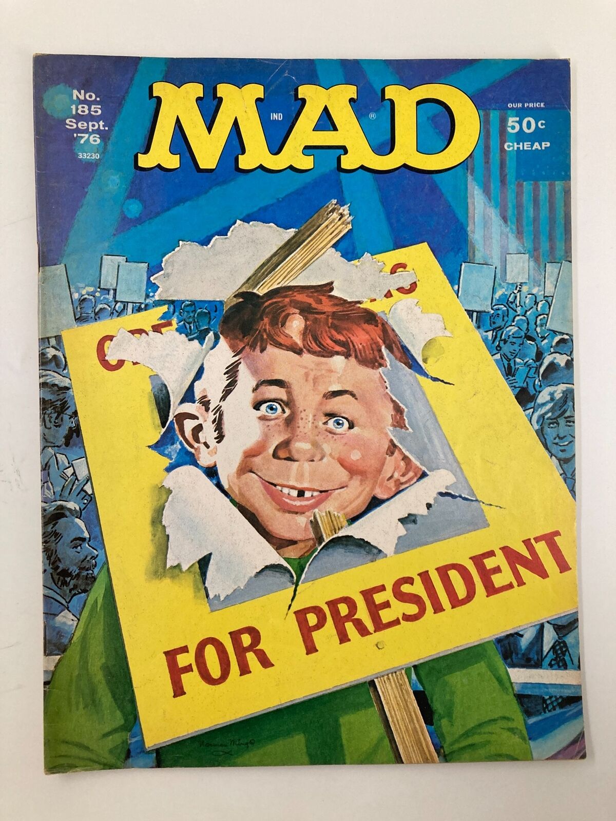 Cover of Mad Magazine September 1976 No. 185, featuring the iconic character Alfred E. Neuman with a campaign sign reading 'FOR PRESIDENT', showcasing vibrant colors and humorous political satire.