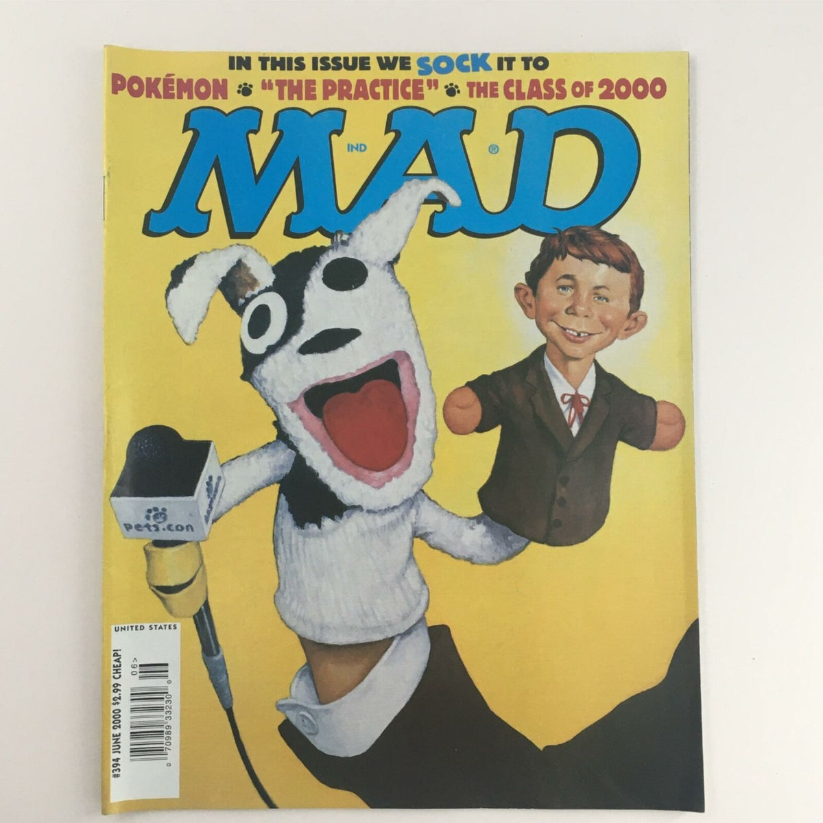 Cover of Mad Magazine June 2000 No. 394 featuring a playful puppet and a smiling boy, highlighting the theme 'We Sock It To Pokemon'.