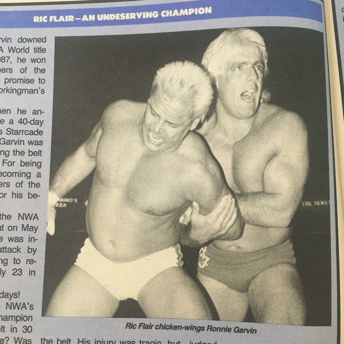 Ric Flair in action with Ronnie Garvin in a match featured within Pro Wrestling Illustrated Magazine October 1989.