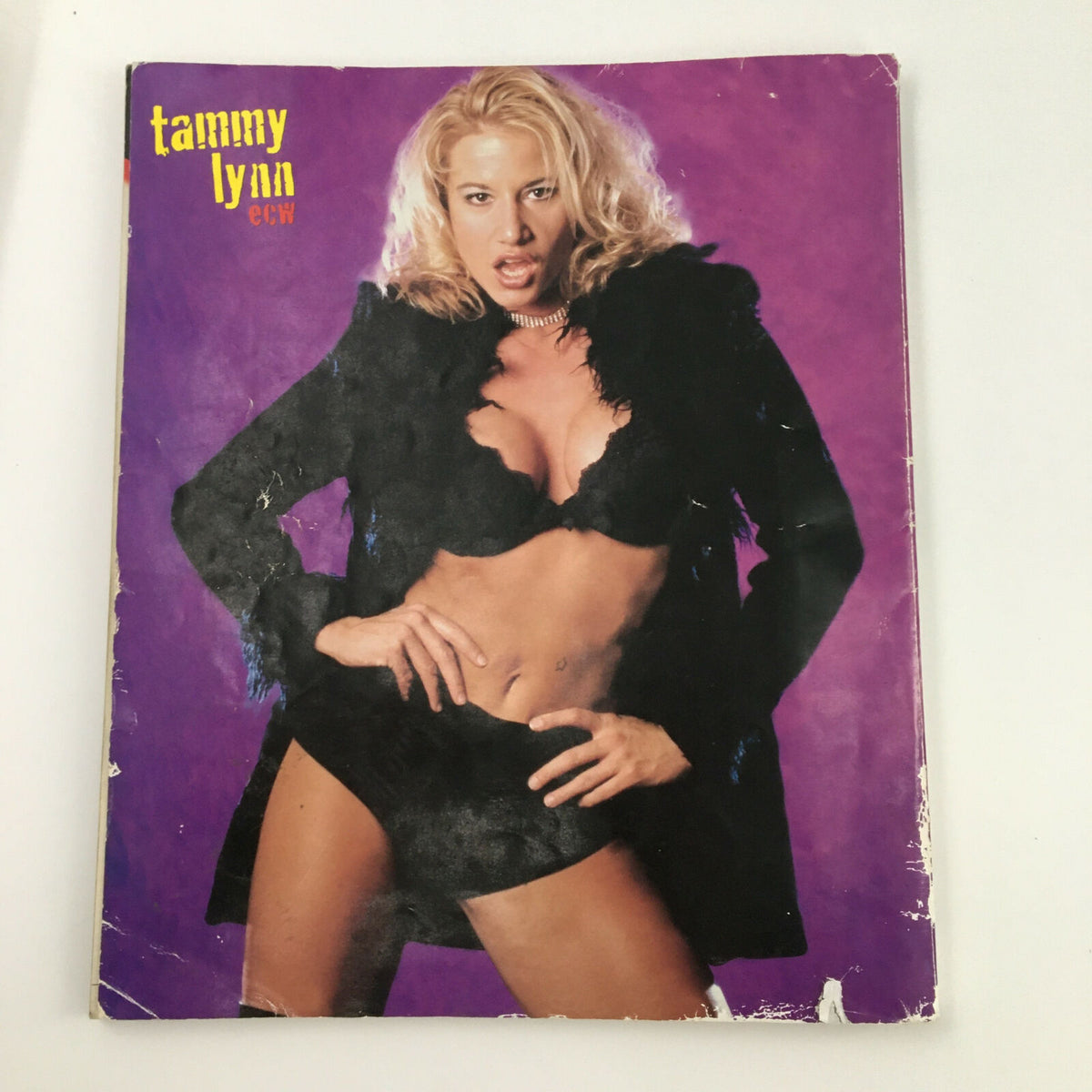 WWF World of Wrestling Magazine May 1999 featuring Tammy Lynn in a glamorous pose, emphasizing her status in professional wrestling. A must-have for collectors.