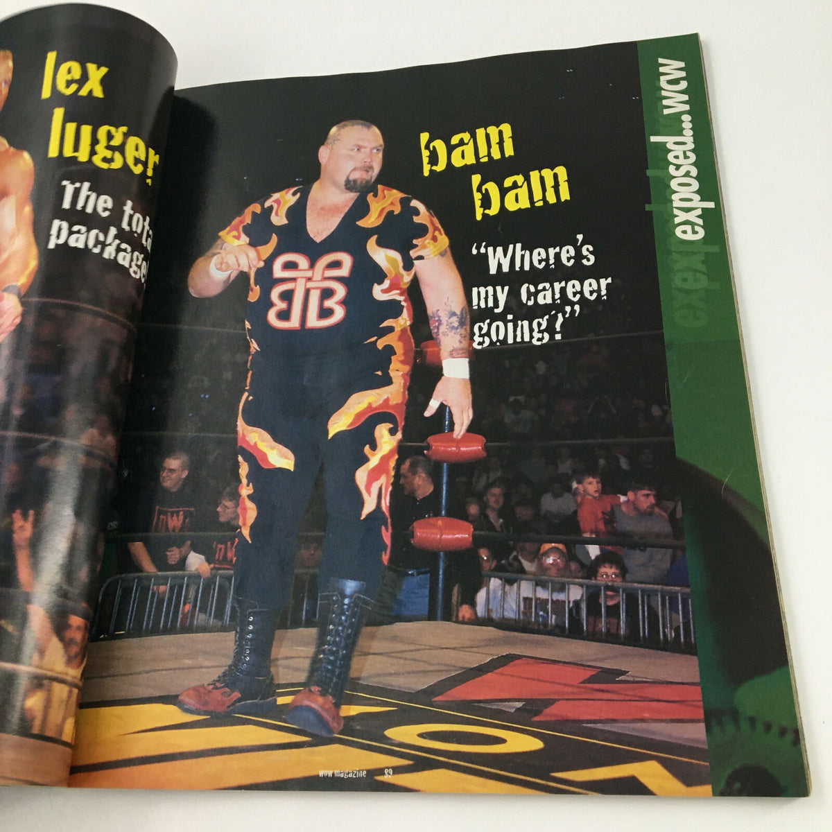 WWF World of Wrestling Magazine May 1999 featuring Bam Bam Bigelow in fiery wrestling attire, highlighting his quote 'Where's my career going?' Perfect for collectors and wrestling enthusiasts.