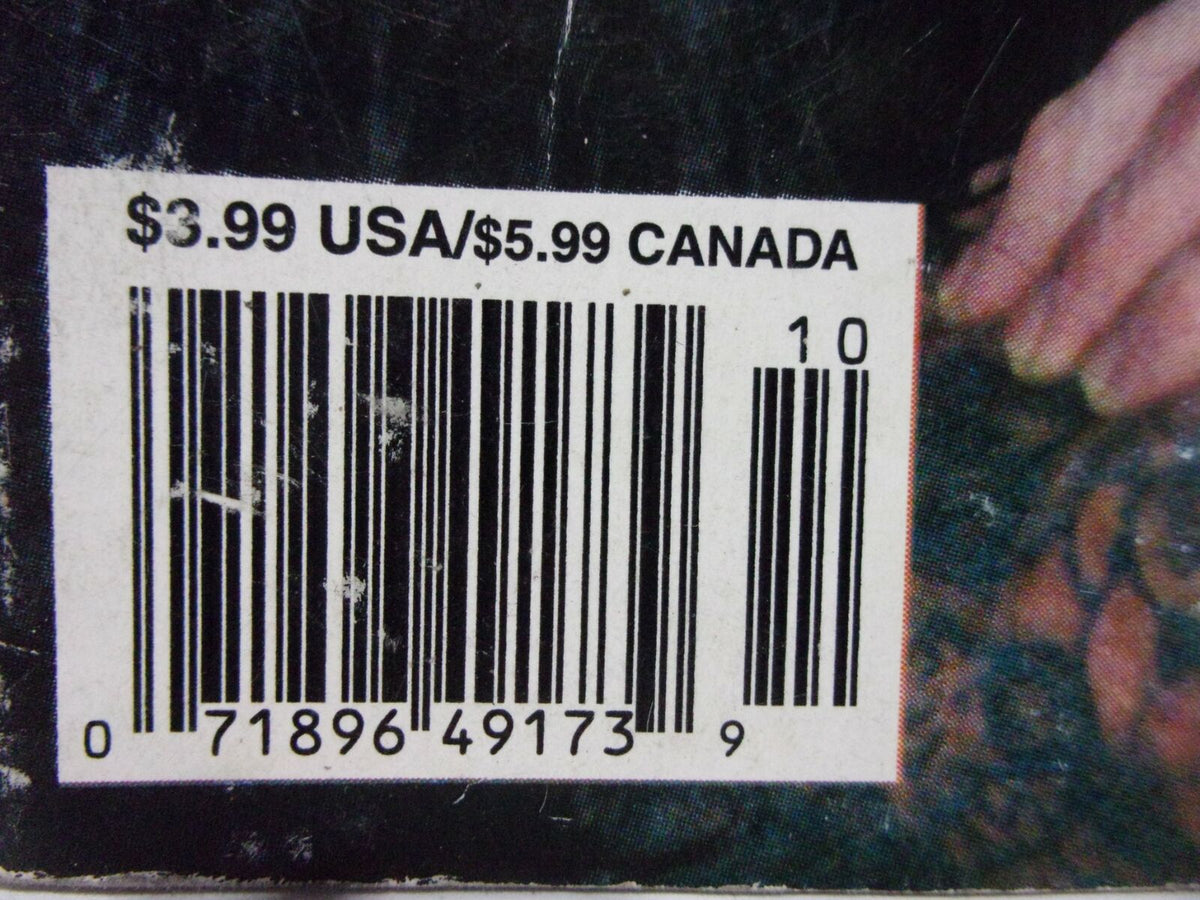 Barcode and price tag for 'Ringside Wrestling: Undertaker "I'll drink Austin's Blood" October 1999', showcasing sale prices of $3.99 in the USA and $5.99 in Canada.