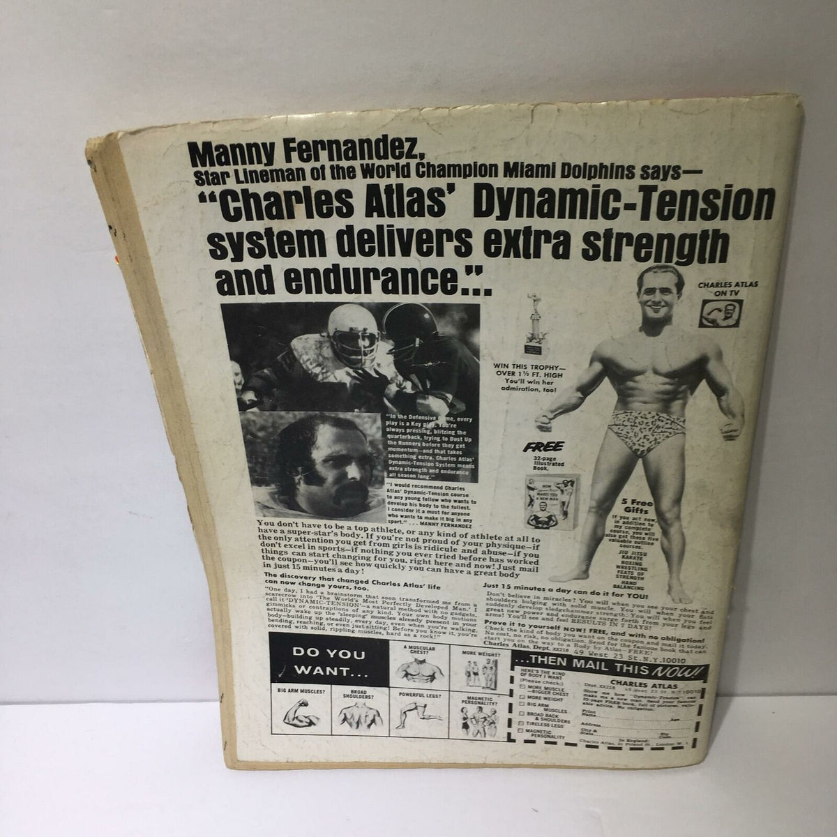 Back cover of the Wrestling 1976 Annual #17 - What the Stars Have in Store for the Stars, featuring a vintage advertisement and information about Charles Atlas.