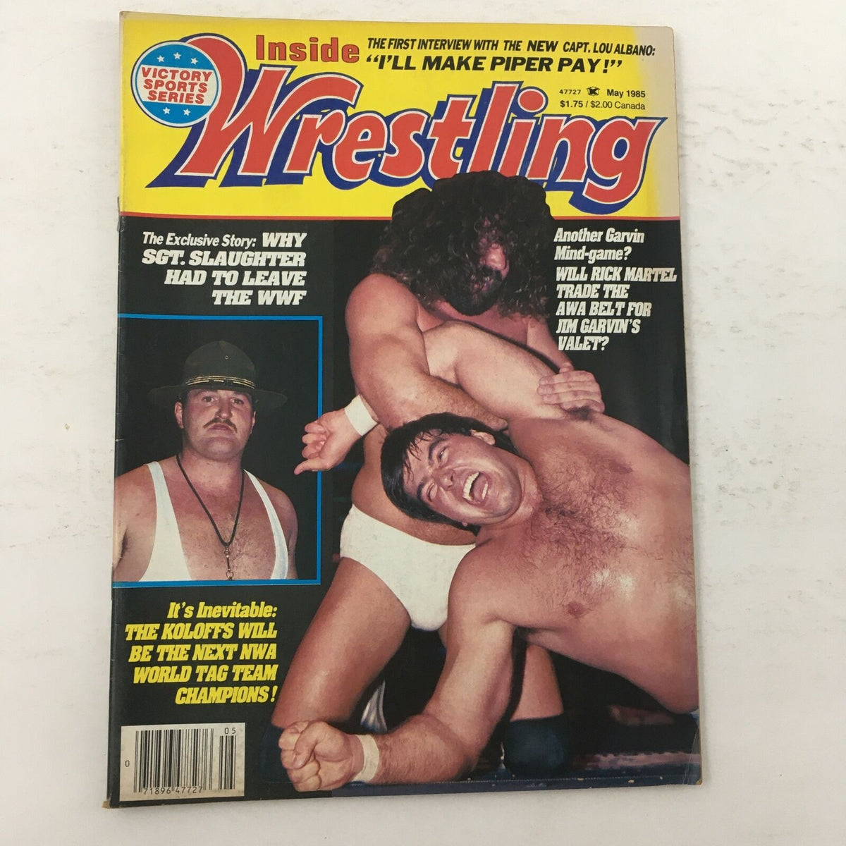 Cover of Inside Wrestling Magazine from May 1985 featuring Rick Martel vs. Jim Garvin, with a highlight on Sgt. Slaughter, showcasing vibrant colors and wrestling action.