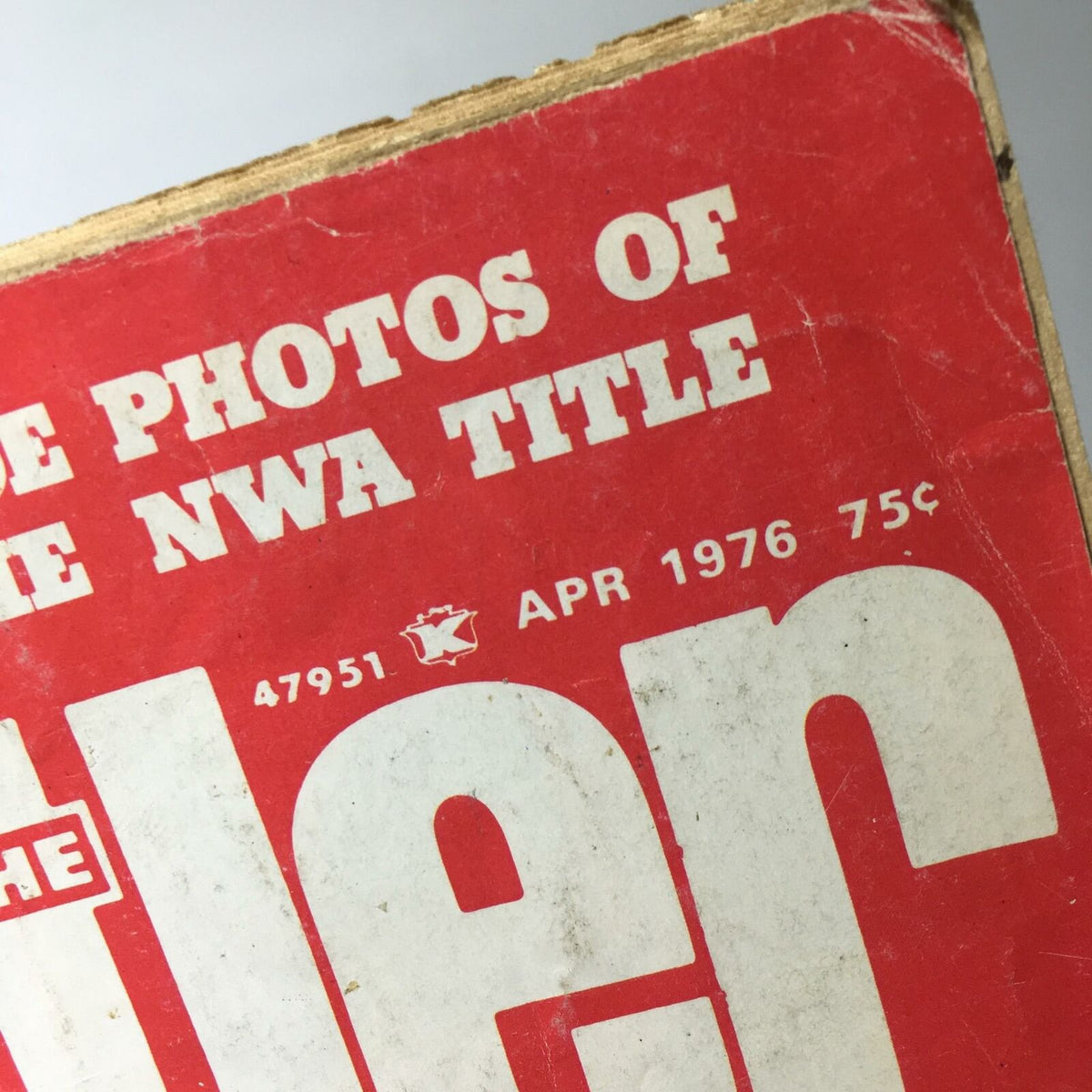 Close-up of The Wrestler Magazine April 1976 showing details of an exclusive feature on Terry Funk winning the NWA title.