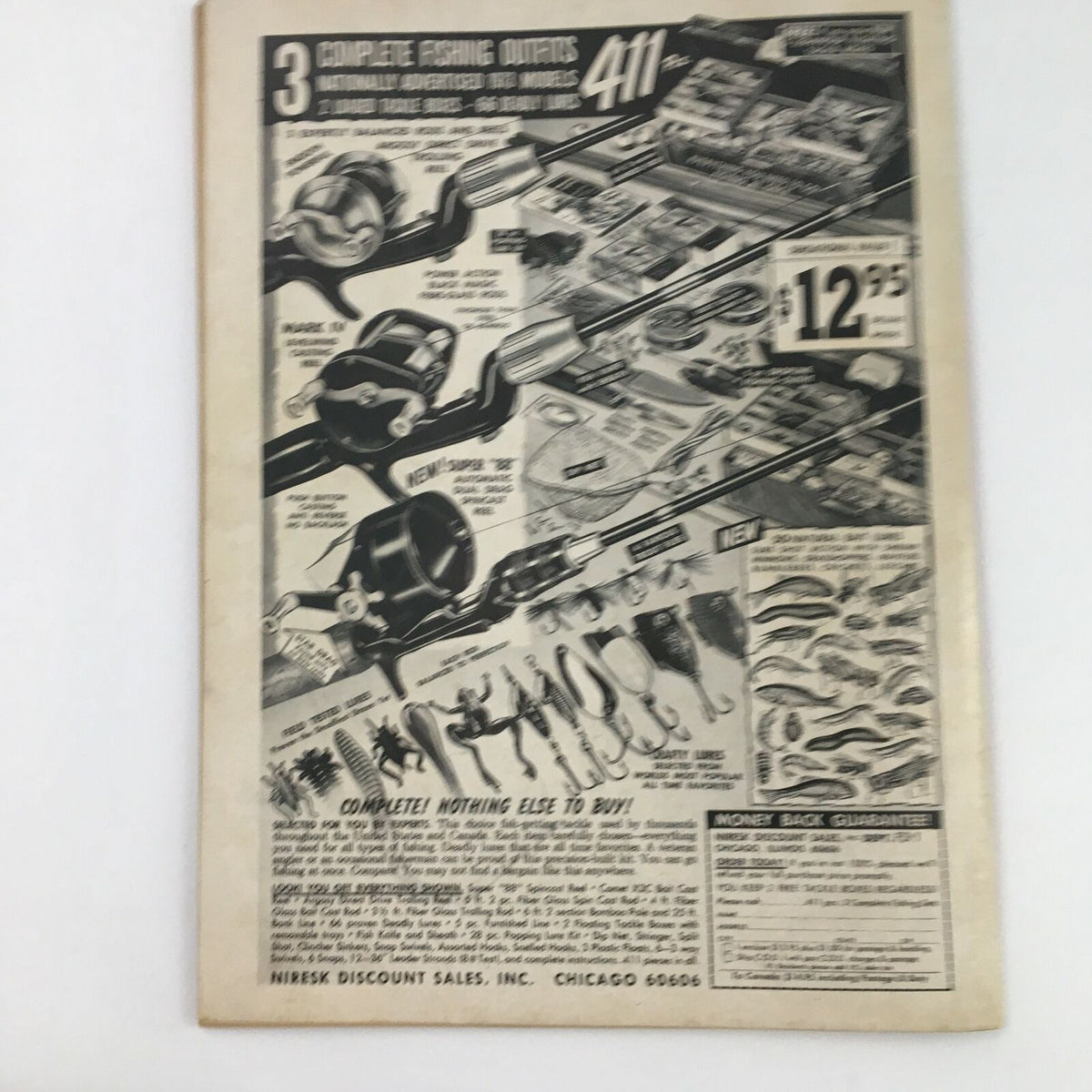 Back cover of The Big Book of Wrestling, May 1973, featuring an advertisement for fishing gear and accessories, showcasing various fishing outfits and tackle, highlighting its vintage appeal.