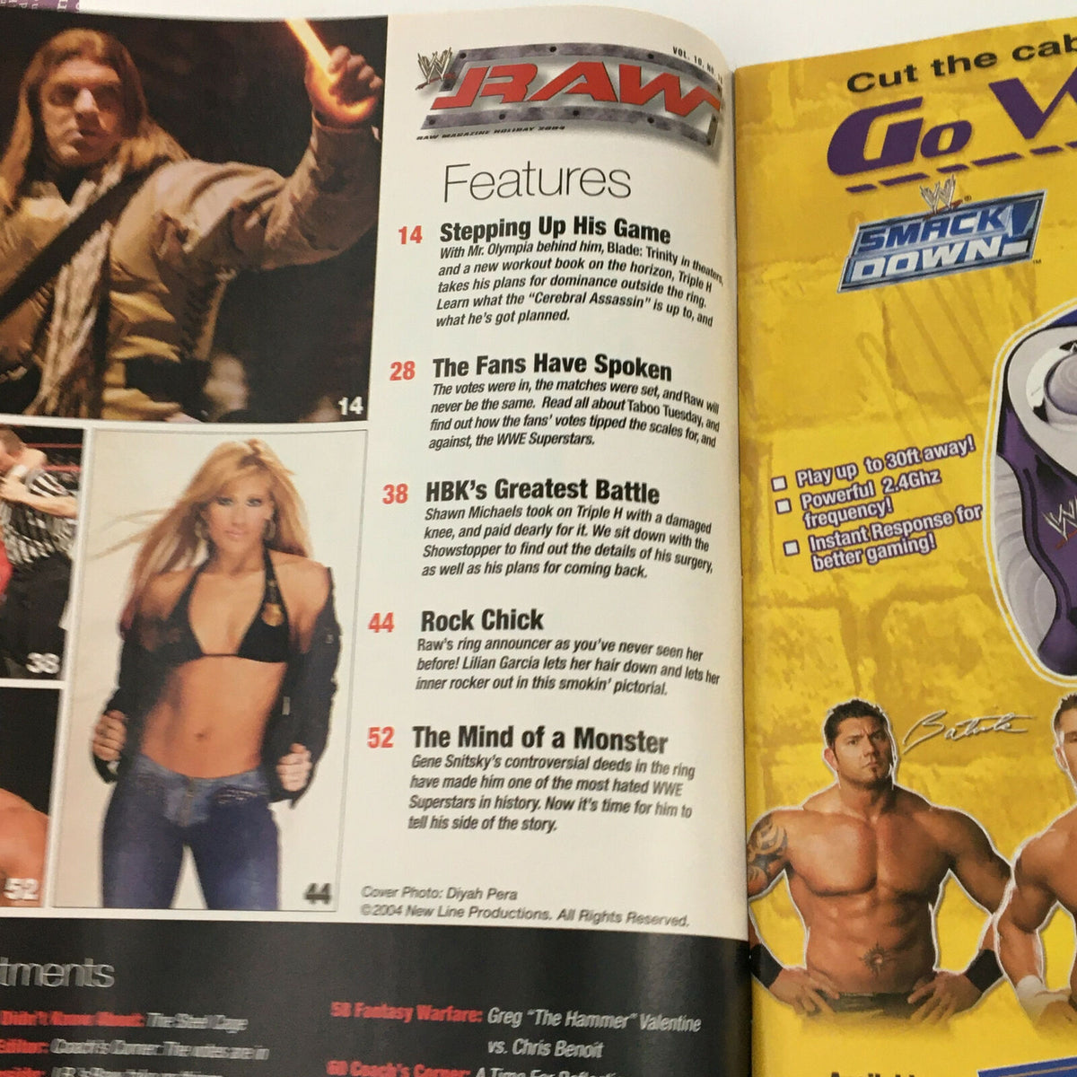 Inside page of WWE Raw Magazine Holiday 2004 with features including articles and images of wrestlers, highlighted by a layout that draws attention to wrestling themes.