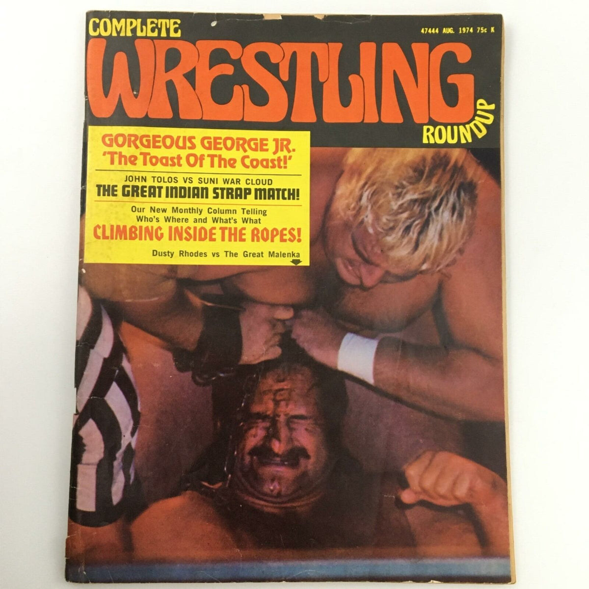 Complete Wrestling Roundup Magazine August 1974 Gorgeous George Jr. featuring a wrestling match cover with vibrant colors and prominent headlines.