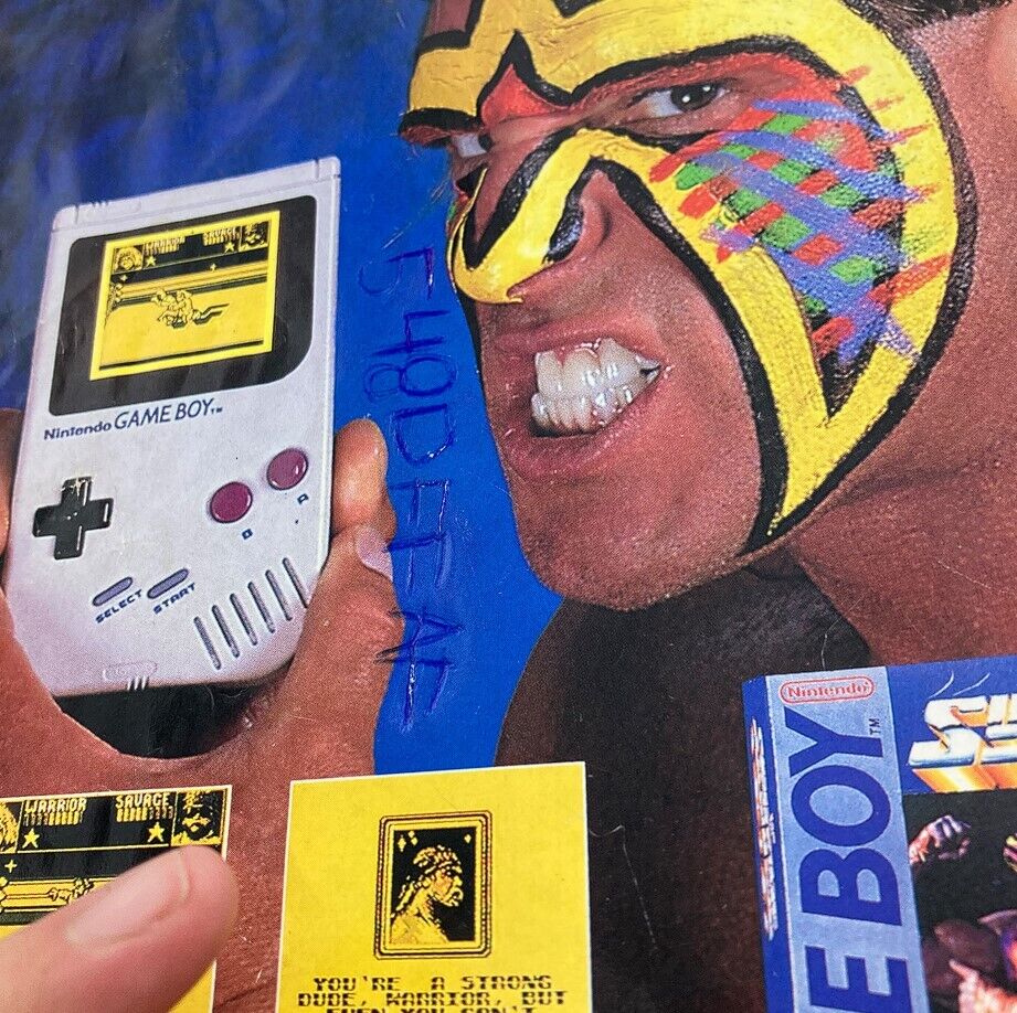 Promotional page from WWF World Wrestling Federation Magazine May 1991 featuring a wrestler holding a Nintendo Game Boy, emphasizing the crossover between wrestling and gaming.