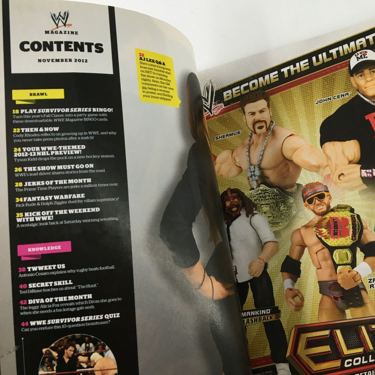 Inside page of WWE Magazine November 2012 displaying the table of contents, including articles on Survivor Series and WWE-themed features, along with action figures promotional content.