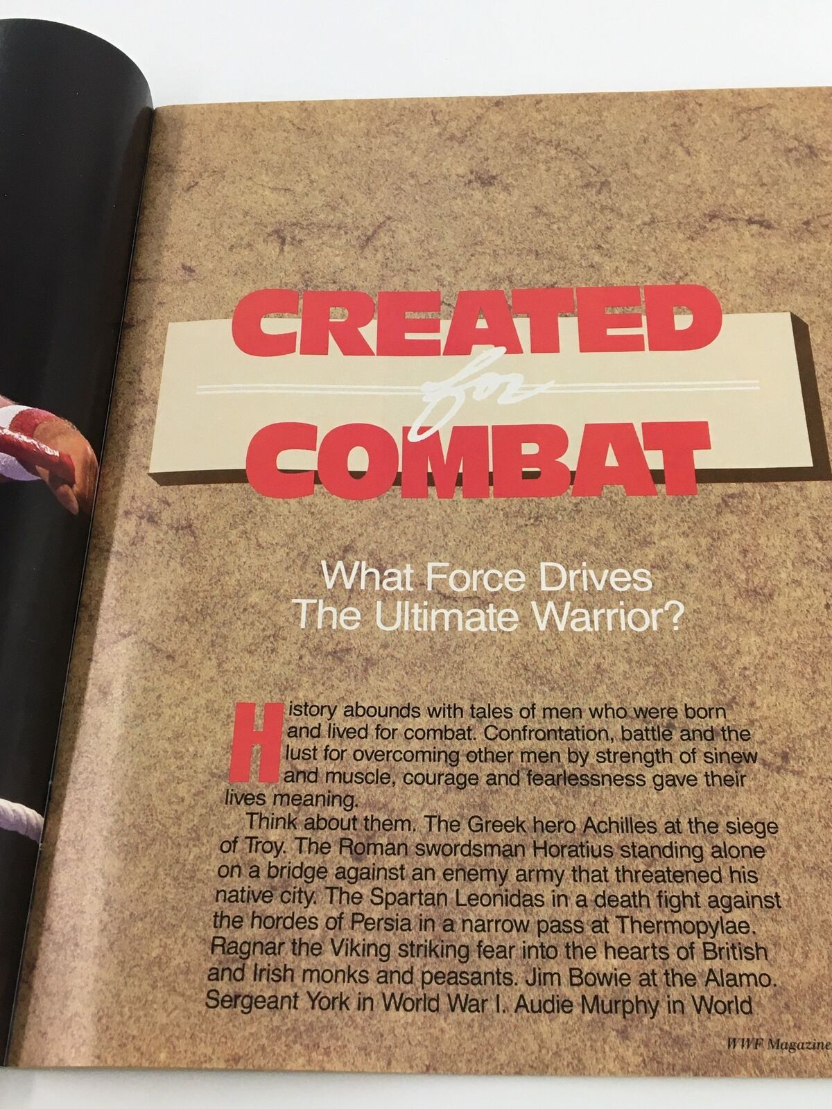 A detailed page from VTG WWF Magazine March 1988 discussing the competitive spirit of The Ultimate Warrior. The layout incorporates bold graphics and text discussing what drives this legendary wrestler in the sport.