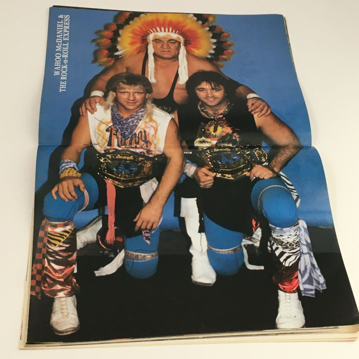 Inside poster from Superstar Wrestler Magazine April 1987 featuring Wahoo McDaniel and The Rock 'n' Roll Express with championship belts.