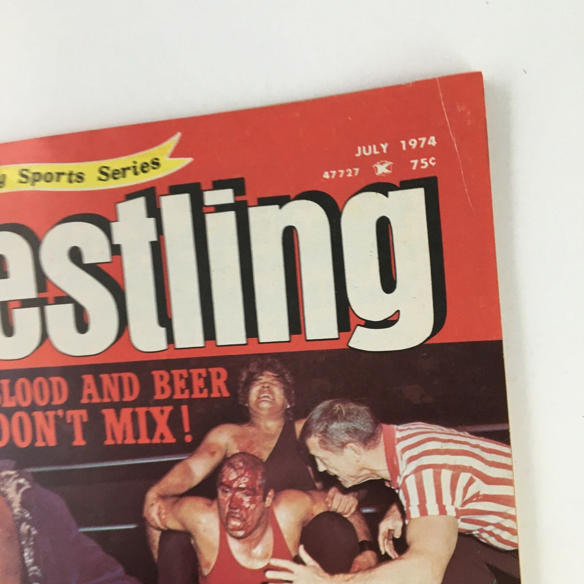 Top corner of Inside Wrestling Magazine July 1974 highlighting the title and the month, featuring the phrase 'Blood and Beer Don't Mix!'