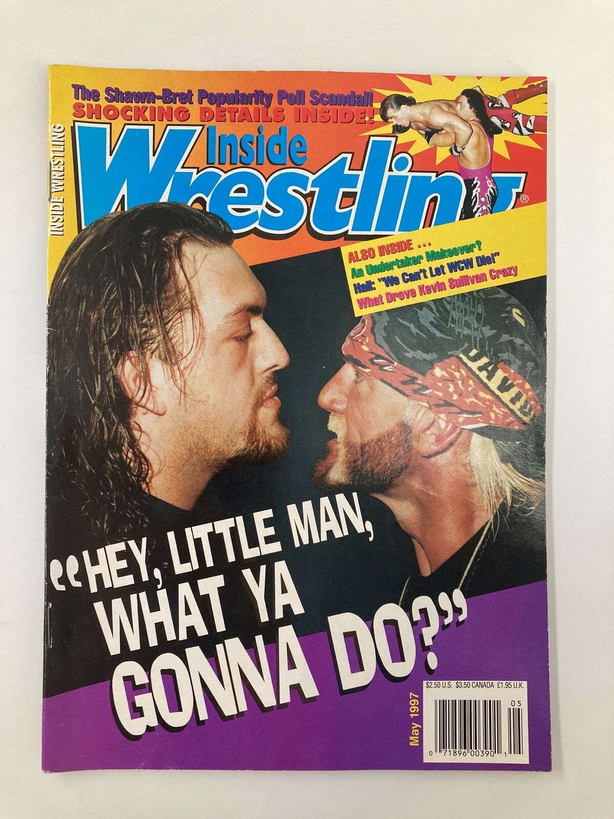 Cover of Inside Wrestling Magazine May 1997 featuring The Giant and Hulk Hogan, showcasing a dramatic face-off and highlighted with attention-grabbing text about wrestling news.