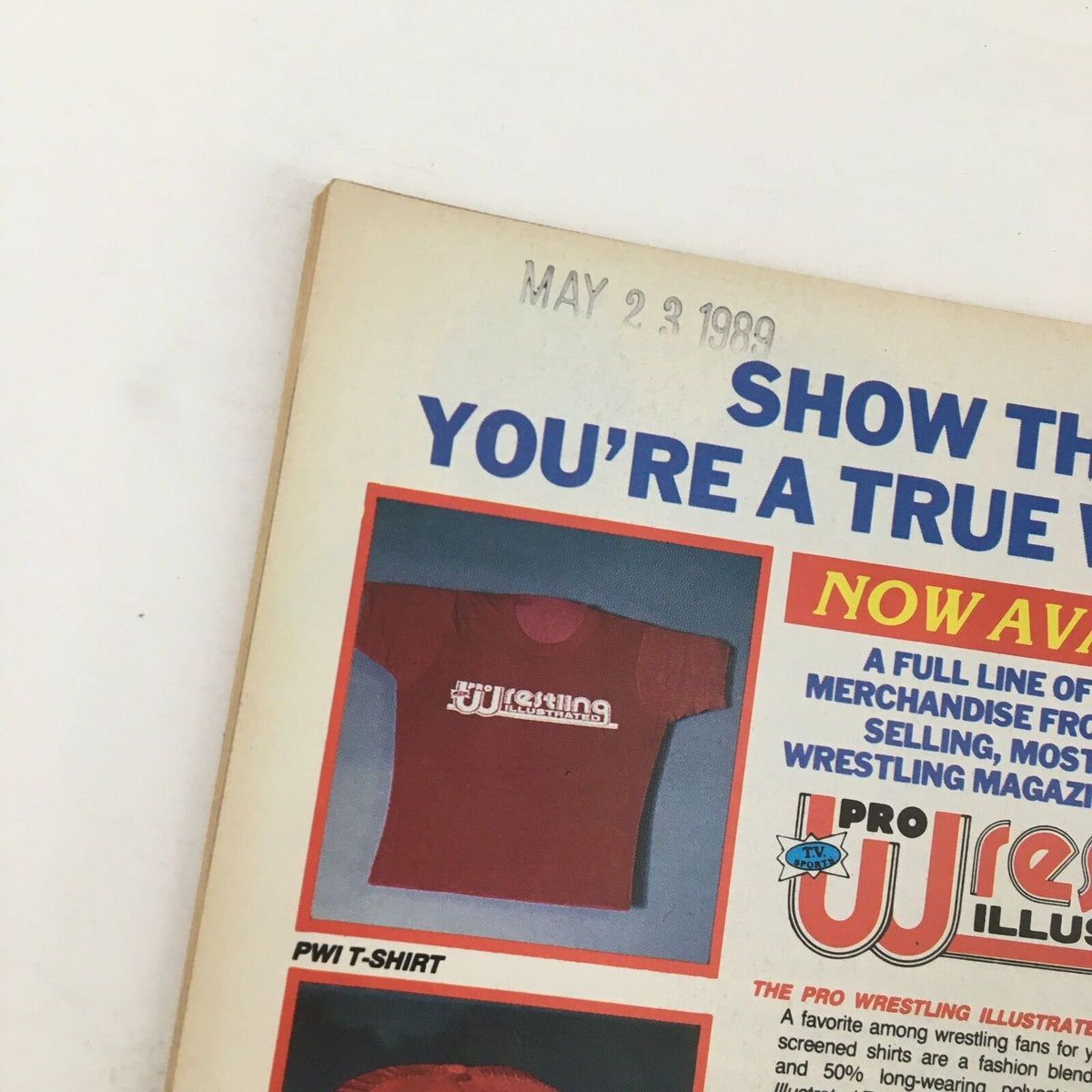 Close-up of the back cover of Sports Review Wrestling Magazine July 1989, showcasing a red PWI t-shirt advertisement and promotional text highlighting wrestling merchandise.