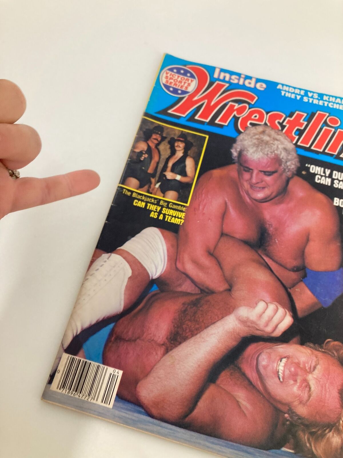 Close-up view of the VTG Inside Wrestling Magazine April 1982 cover highlighting Dusty Rhodes in a wrestling match, with The Blackjacks featured in a corner inset.