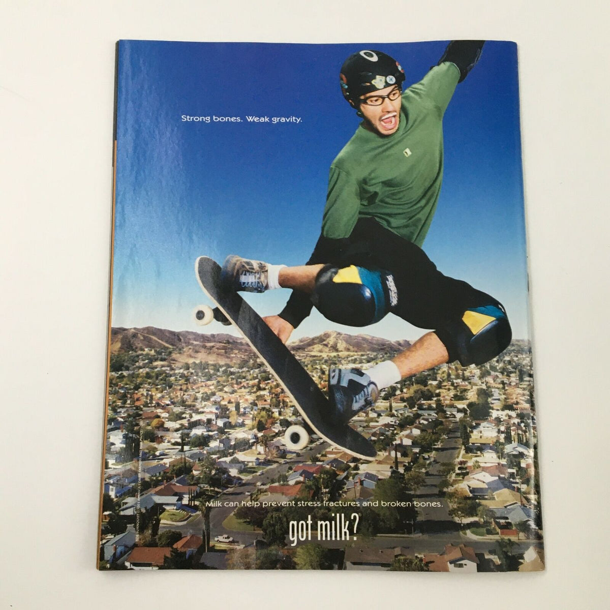 Back cover of WWE Magazine April 2003 with a 'Got Milk?' advertisement featuring a skateboarder.