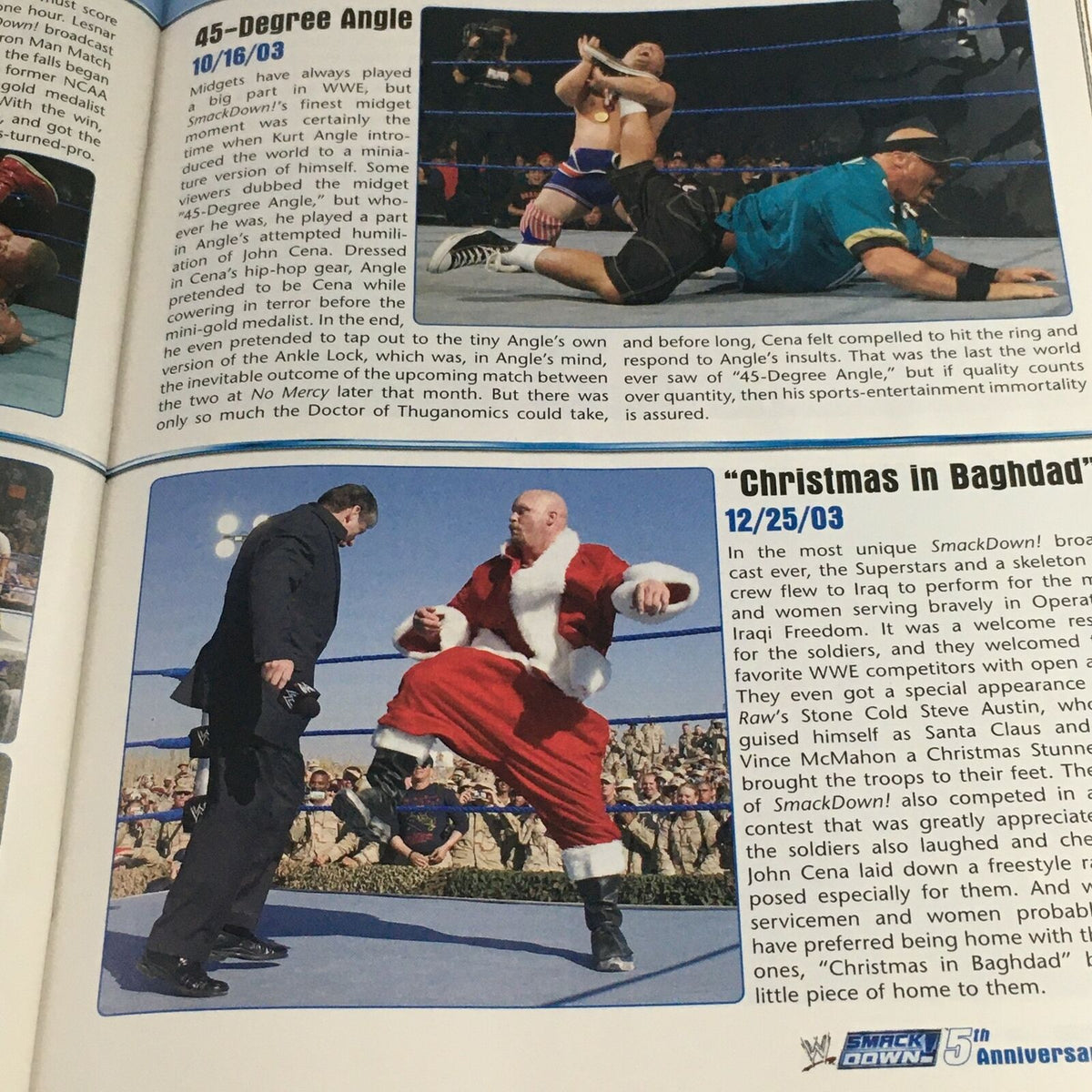 WWE Smack Down Magazine November 2004 depicting John Cena in a comedic wrestling scene labeled 'Christmas in Baghdad.' Illustrates Cena's versatility and charm in the ring.