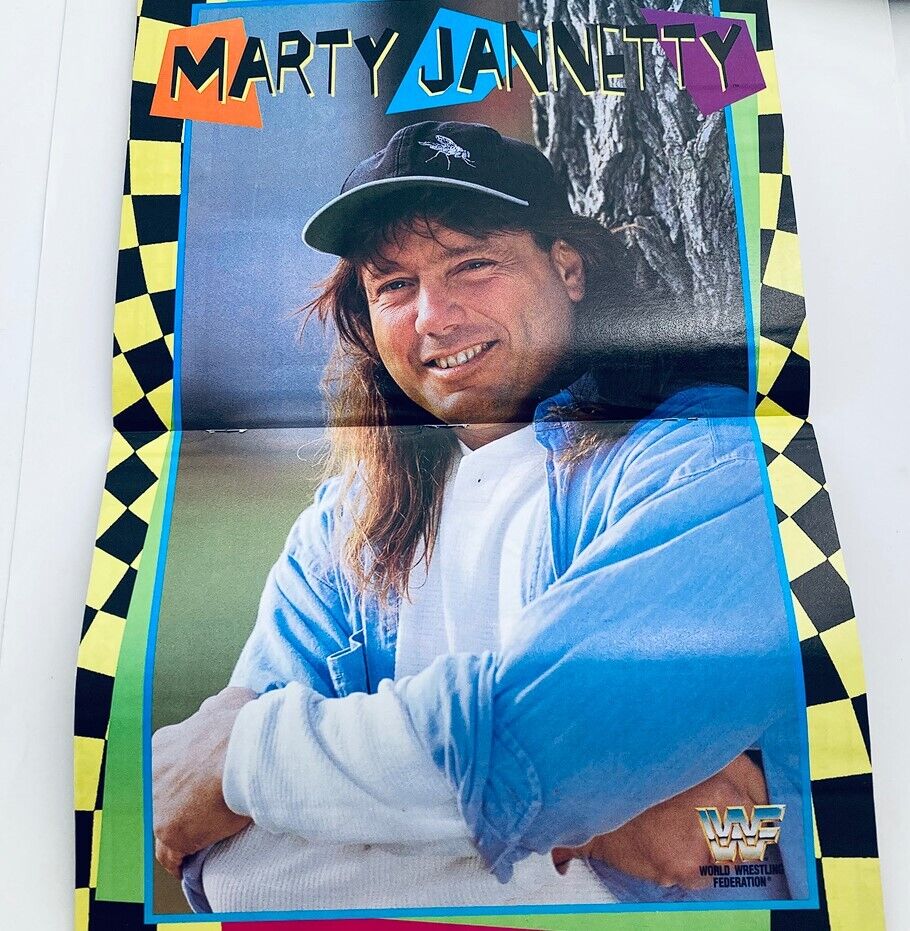 Poster of Marty Jannetty featured in WWF World Wrestling Federation Magazine January 1996, depicting his friendly smile and casual attire against a colorful background.