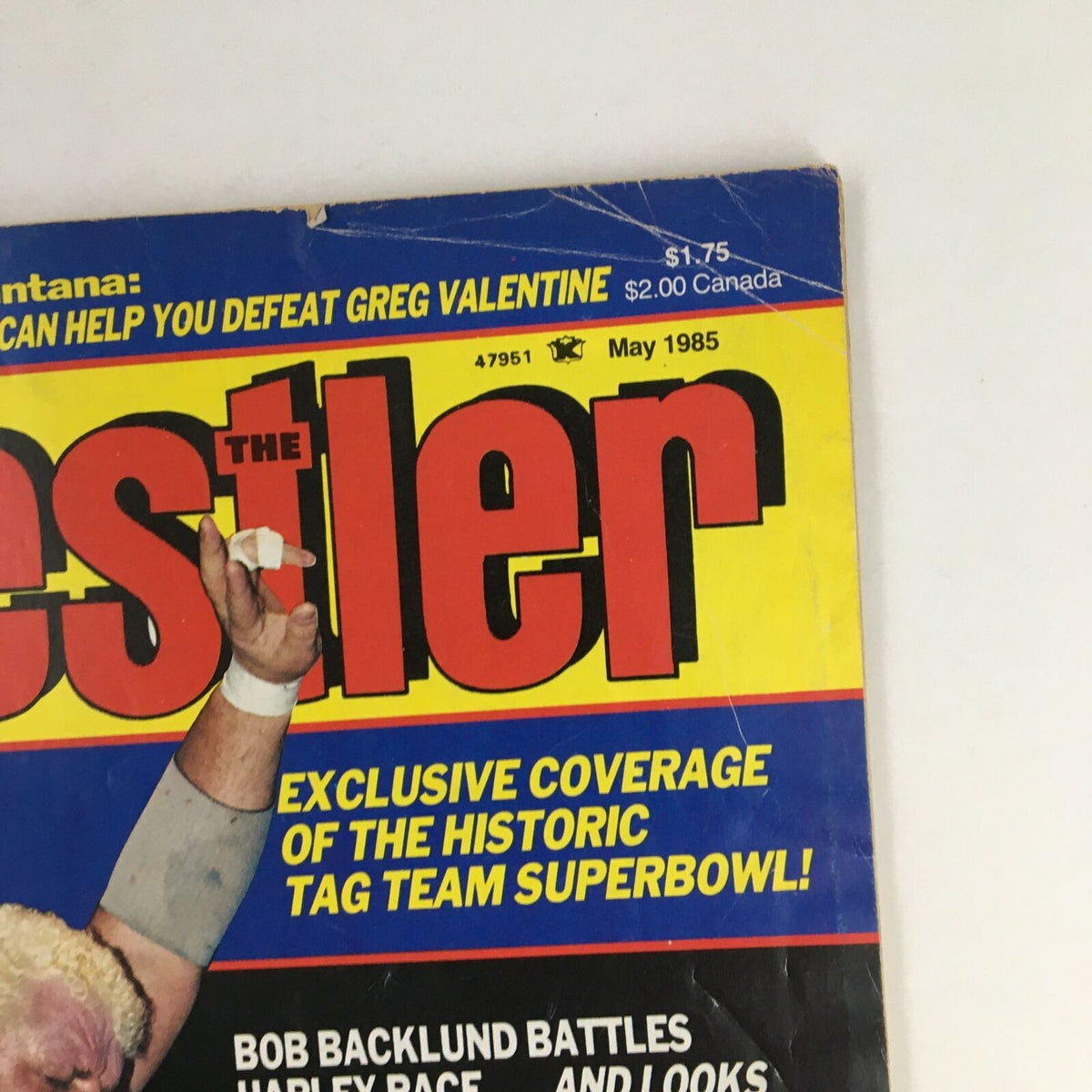 Close-up view of The Wrestler Magazine May 1985 cover showing the title and part of the wrestling action. Features exclusive coverage of the historic tag team super bowl.