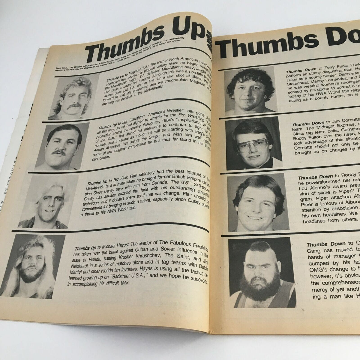 Inside page of The Wrestler Magazine May 1985 illustrating the 'Thumbs Up, Thumbs Down' section discussing various wrestlers and their performances.