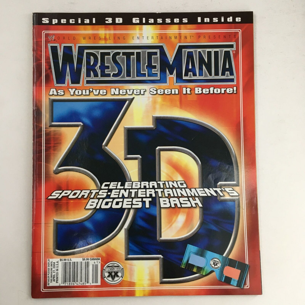 WWE Wrestle Mania April 2004 magazine cover featuring 3D sports-entertainment graphics. Includes special 3D glasses offer.