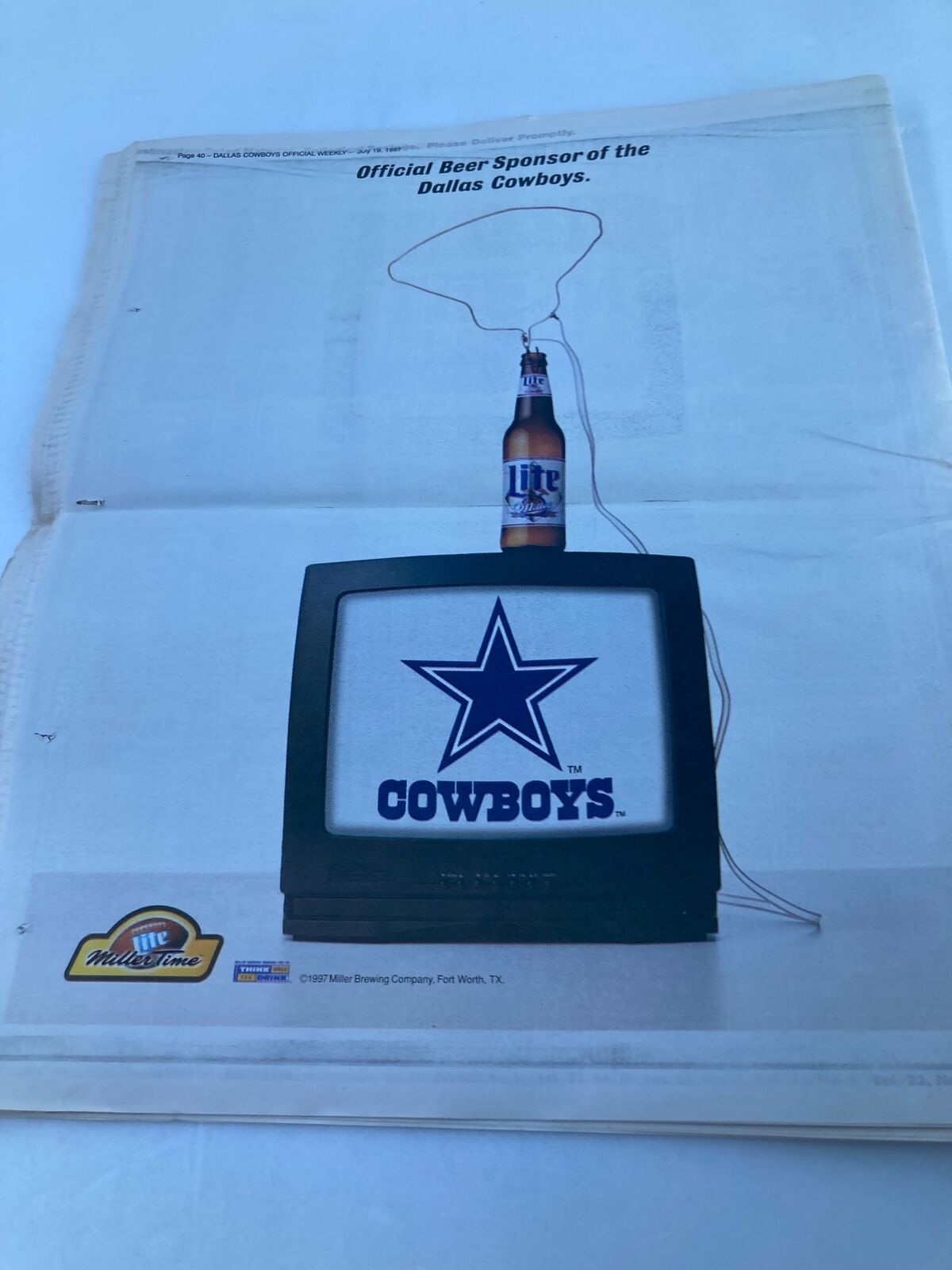 Dallas Cowboys Weekly Newspaper July 19 1997 Vol 23 #6 Chad Hennings featuring a vintage advertisement showing a television displaying the Dallas Cowboys logo. The image highlights the official beer sponsor, Miller Lite, showcasing a bottle placed on top of the TV.