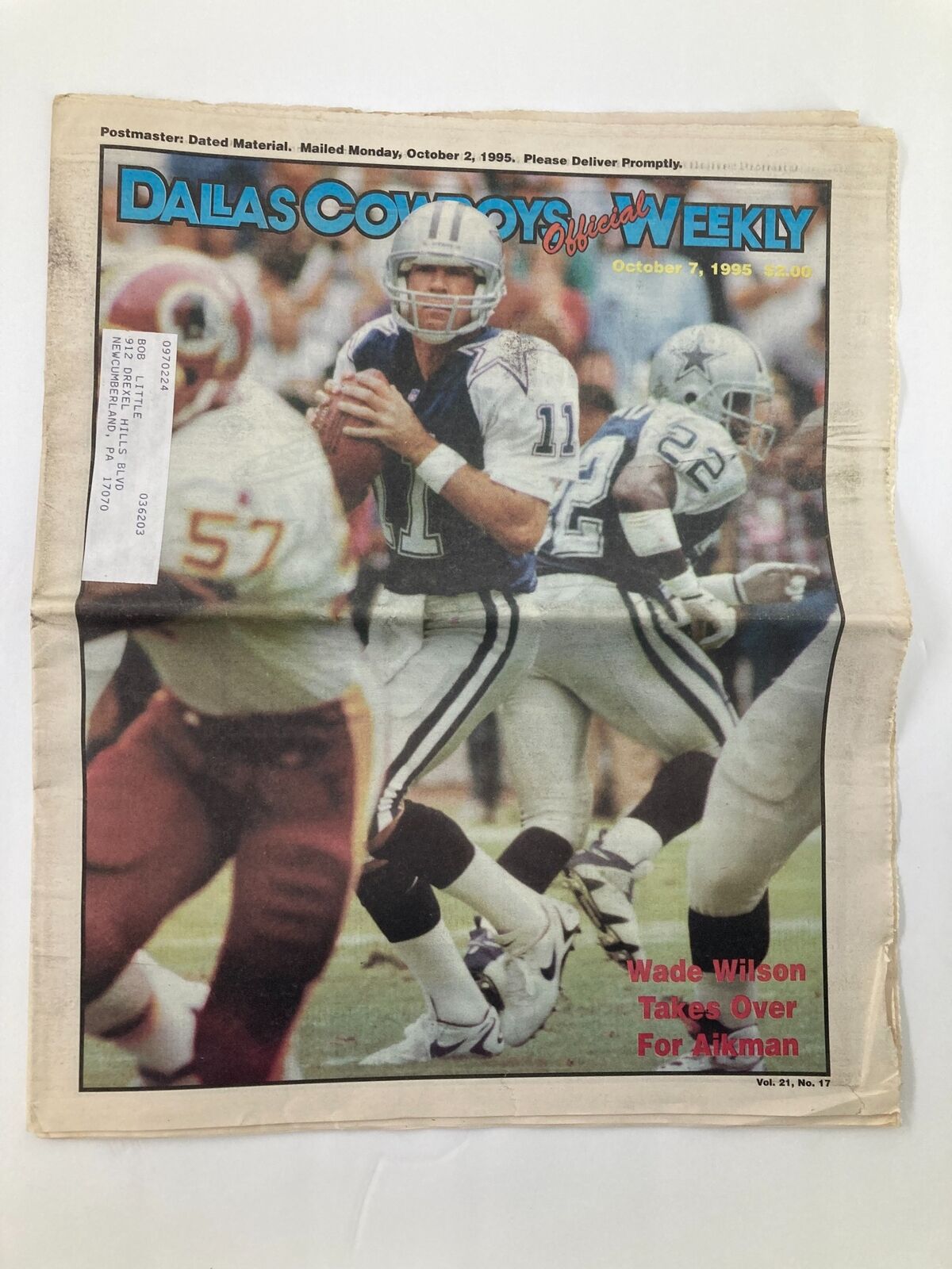Dallas Cowboys Weekly Newspaper from October 7, 1995, featuring Wade Wilson on the cover, showcasing him throwing a pass against the Redskins.