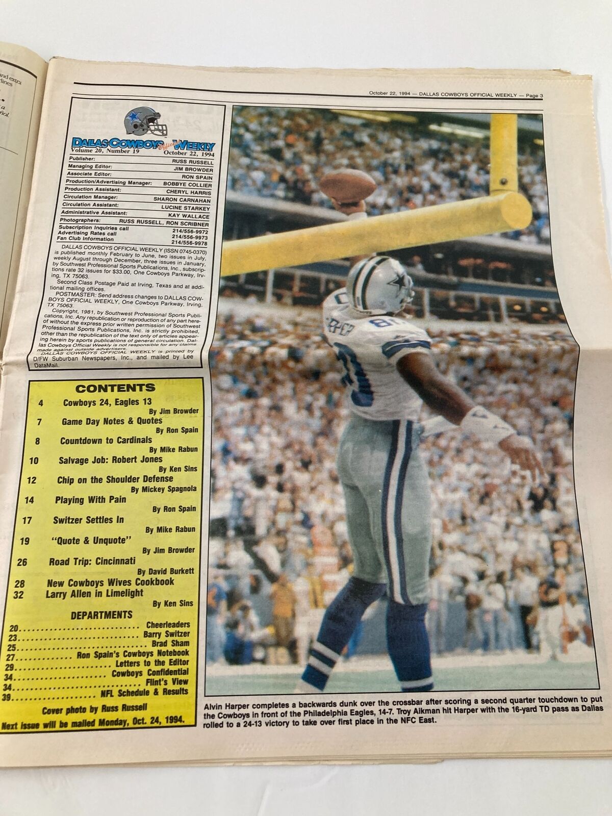 Inside page of Dallas Cowboys Weekly newspaper, October 22, 1994, featuring Alonzo Harper scoring a touchdown against the Eagles.
