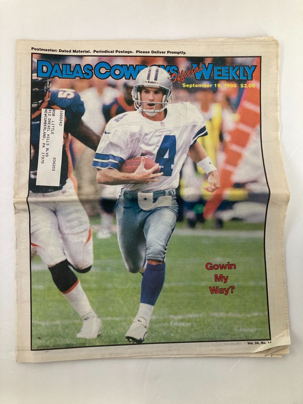 Dallas Cowboys Weekly Newspaper September 19 1998 Vol 24 #14 featuring player Toby Gowin running on the field, showcasing the excitement of a football game.