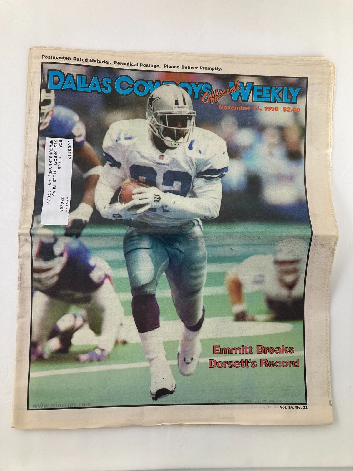 Dallas Cowboys Weekly Newspaper November 14 1998 Vol 24 #22 Emmitt Smith on the cover, showcasing Emmitt Smith in action with a football, commemorating his record-breaking achievement. The iconic magazine features the headline 'Emmitt Breaks Dorsett's Record.'