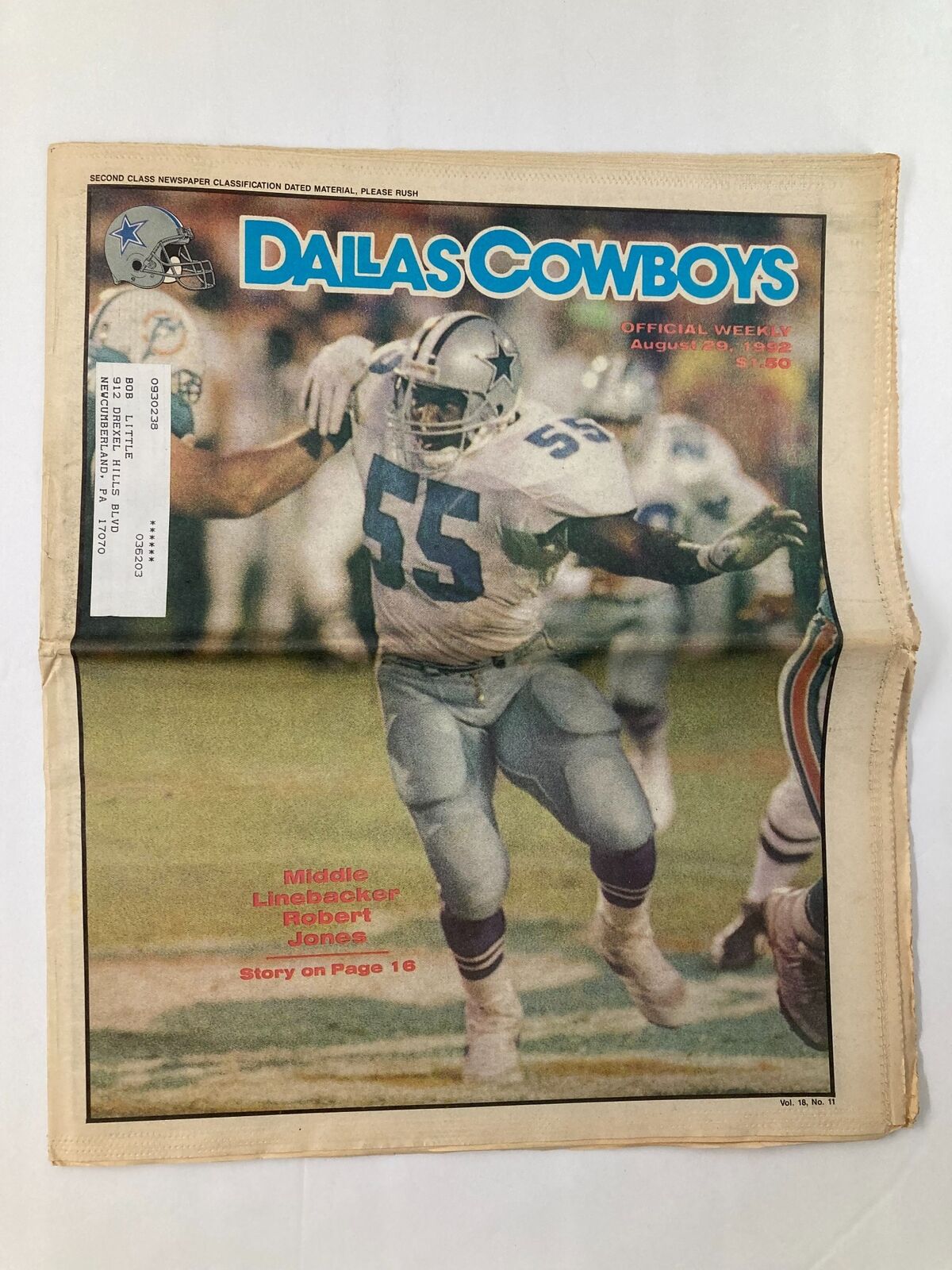 Cover of Dallas Cowboys Weekly Newspaper August 29 1992 Vol 18 #11 featuring Robert Jones, showcasing linebacker action with a player celebrating a tackle.