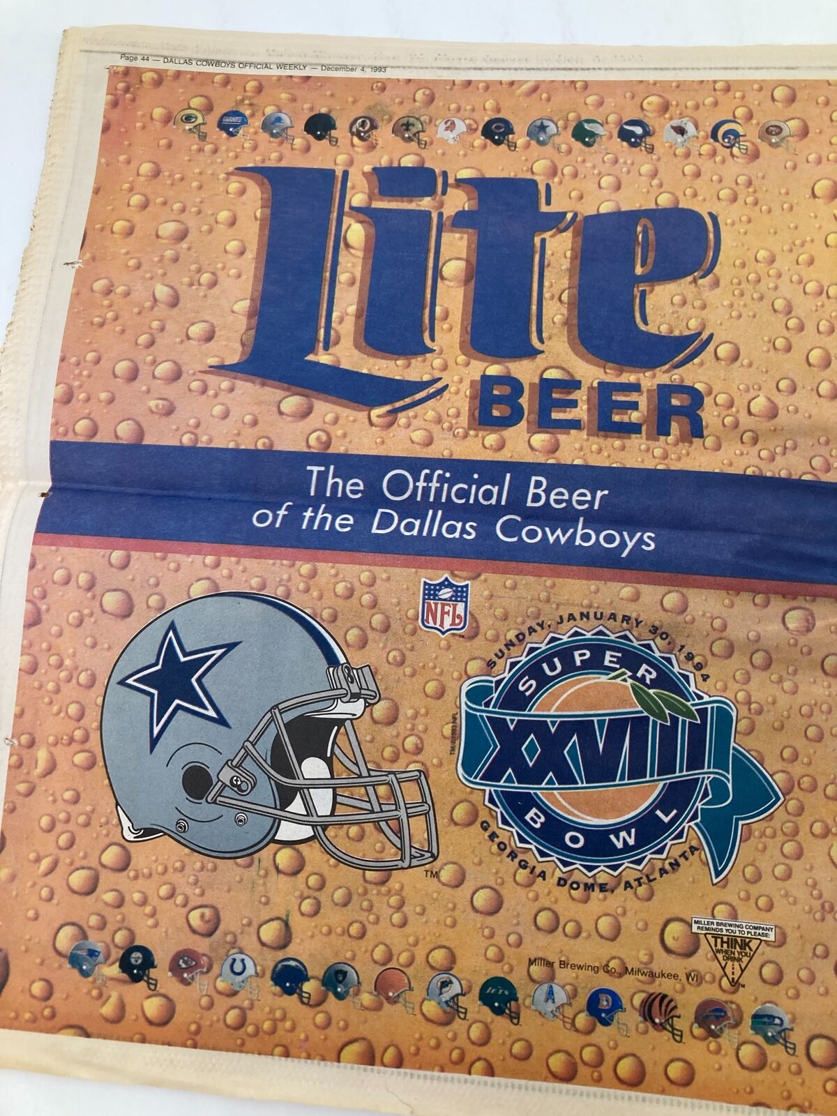 Dallas Cowboys Weekly Newspaper December 4 1993 Vol 19 #24 featuring an advertisement for Lite Beer, the official beer of the Dallas Cowboys.