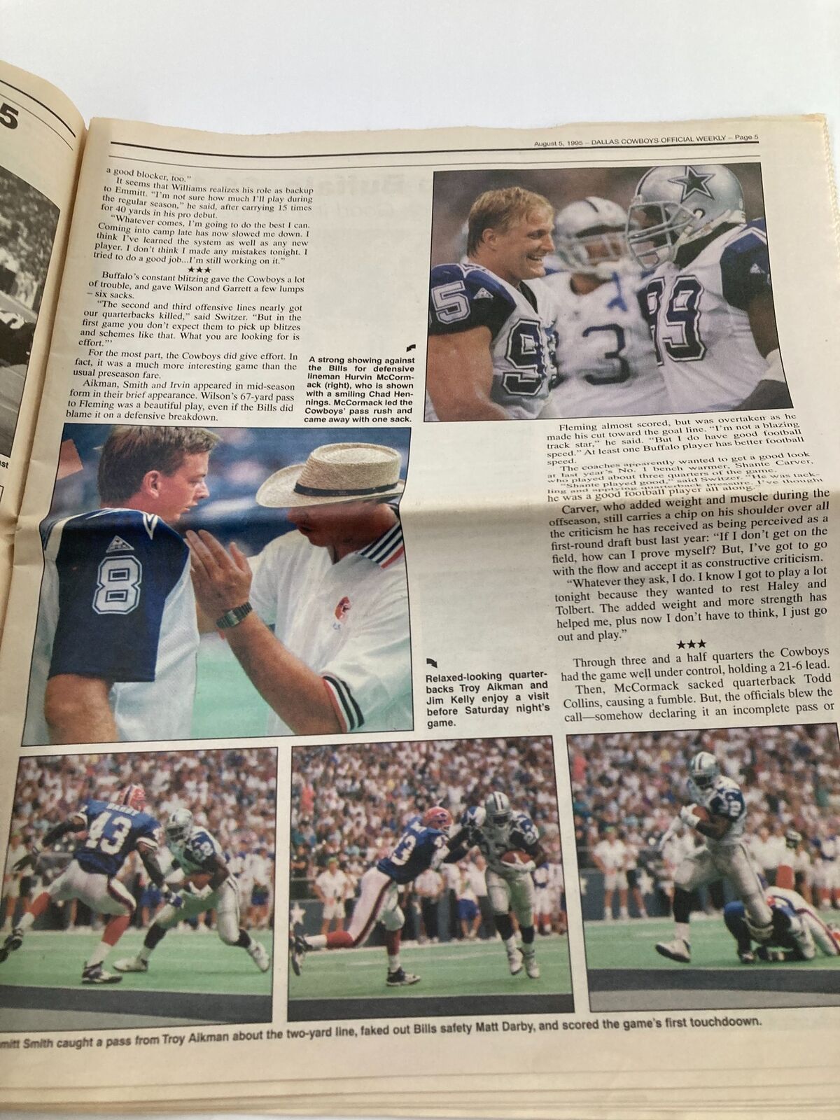 Inside page of Dallas Cowboys Weekly Newspaper August 5 1995 Vol 21 #8, featuring action shots from a Dallas Cowboys game with commentary.