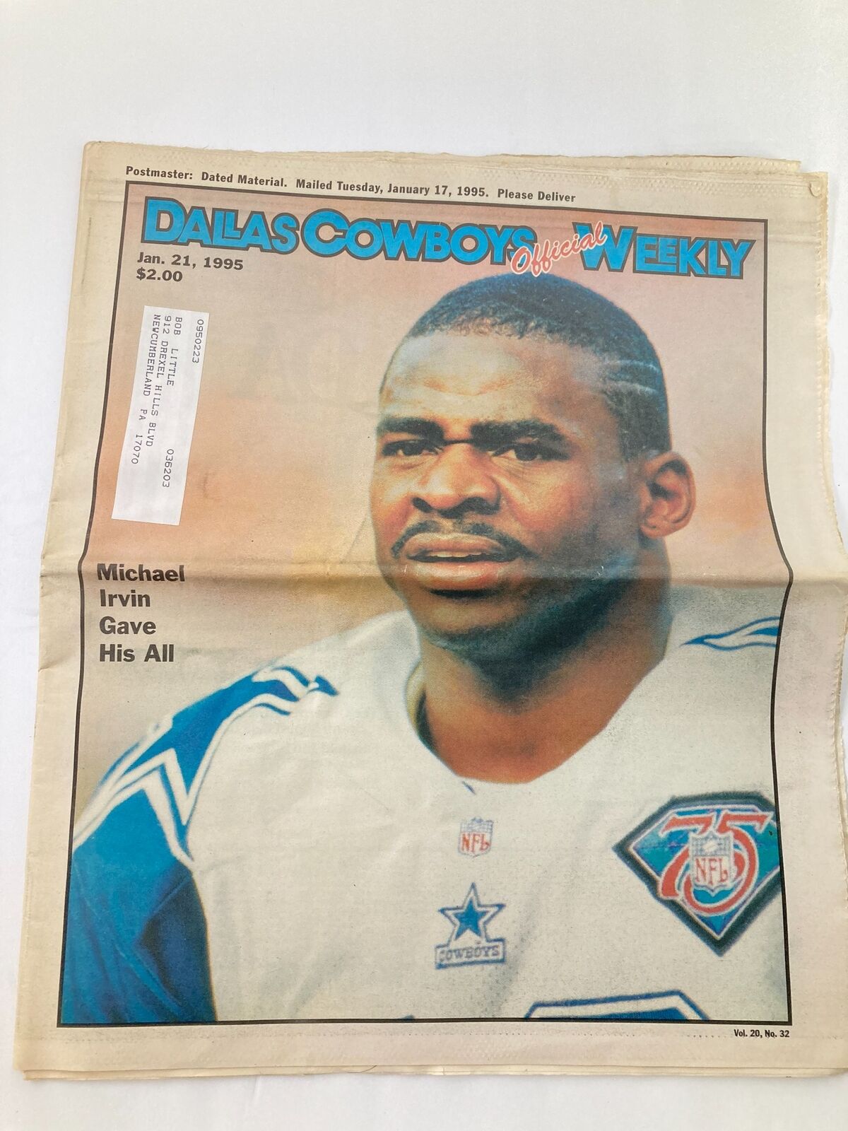 Dallas Cowboys Weekly Newspaper January 21 1995 Vol 20 #32 featuring Michael Irvin, showcasing his dedication to the game. Good condition, folded, with a protective covering and a label on the front.