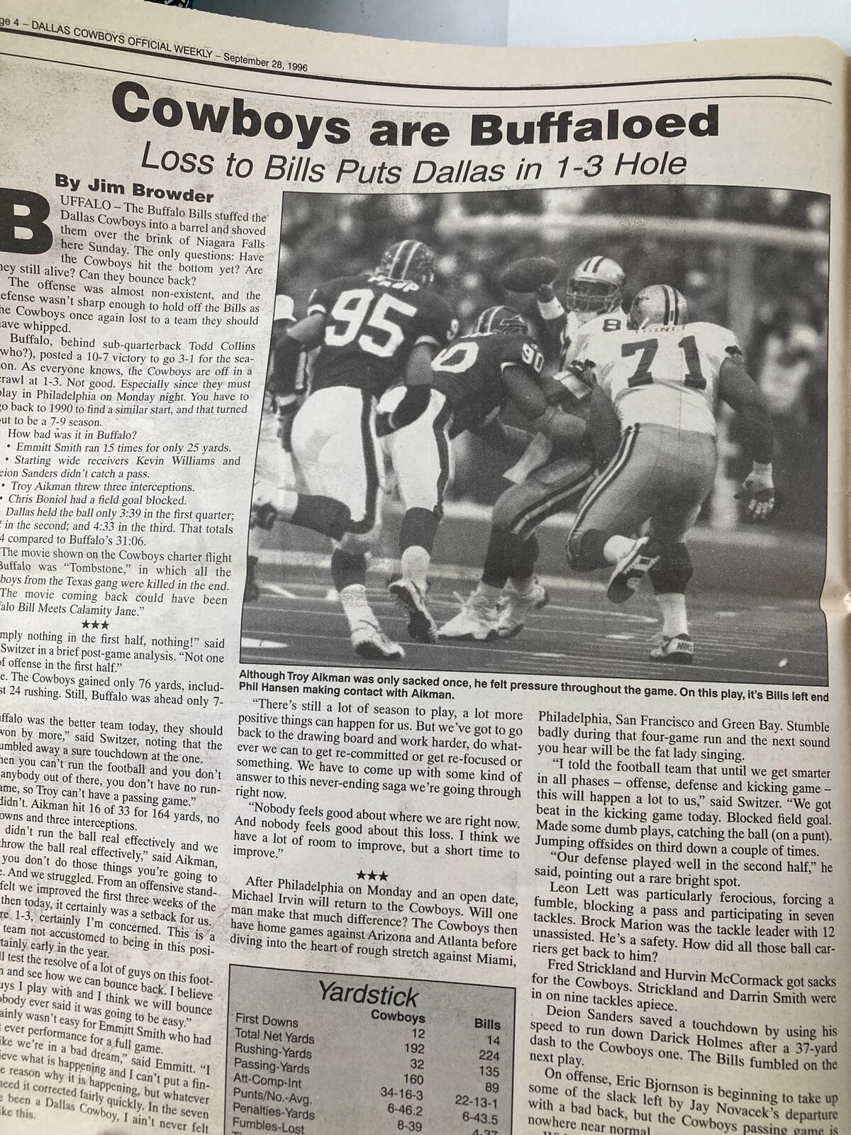 Dallas Cowboys Weekly Newspaper September 28 1996 Vol 22 #16 Leon Lett - Image of the Dallas Cowboys in action against the Buffalo Bills, depicting a play from the game that shows players involved in a tackle.