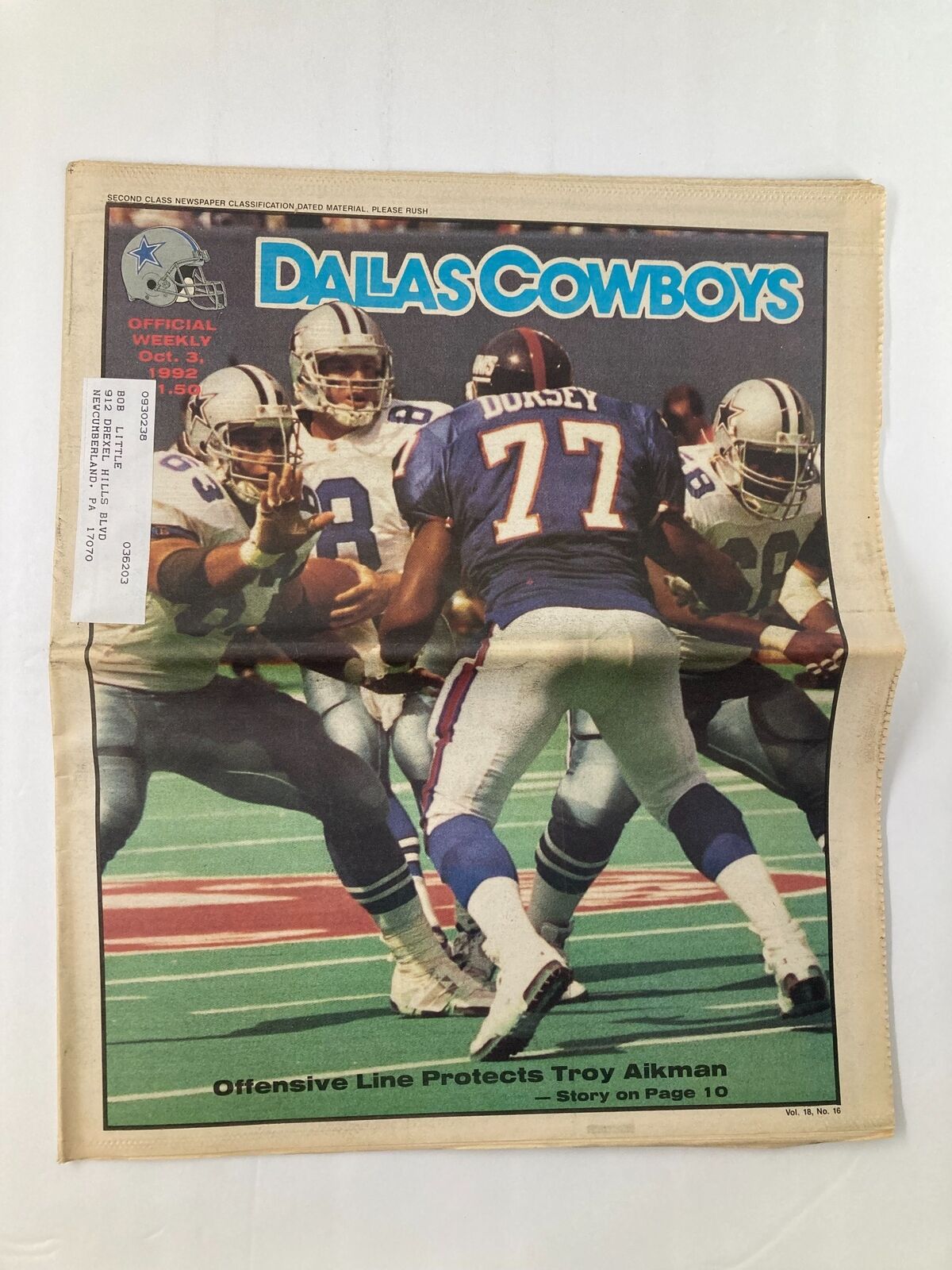 Dallas Cowboys Weekly Newspaper October 3 1992 Vol 18 #16 featuring players on the field including Troy Aikman protected by teammates against an opposing team.