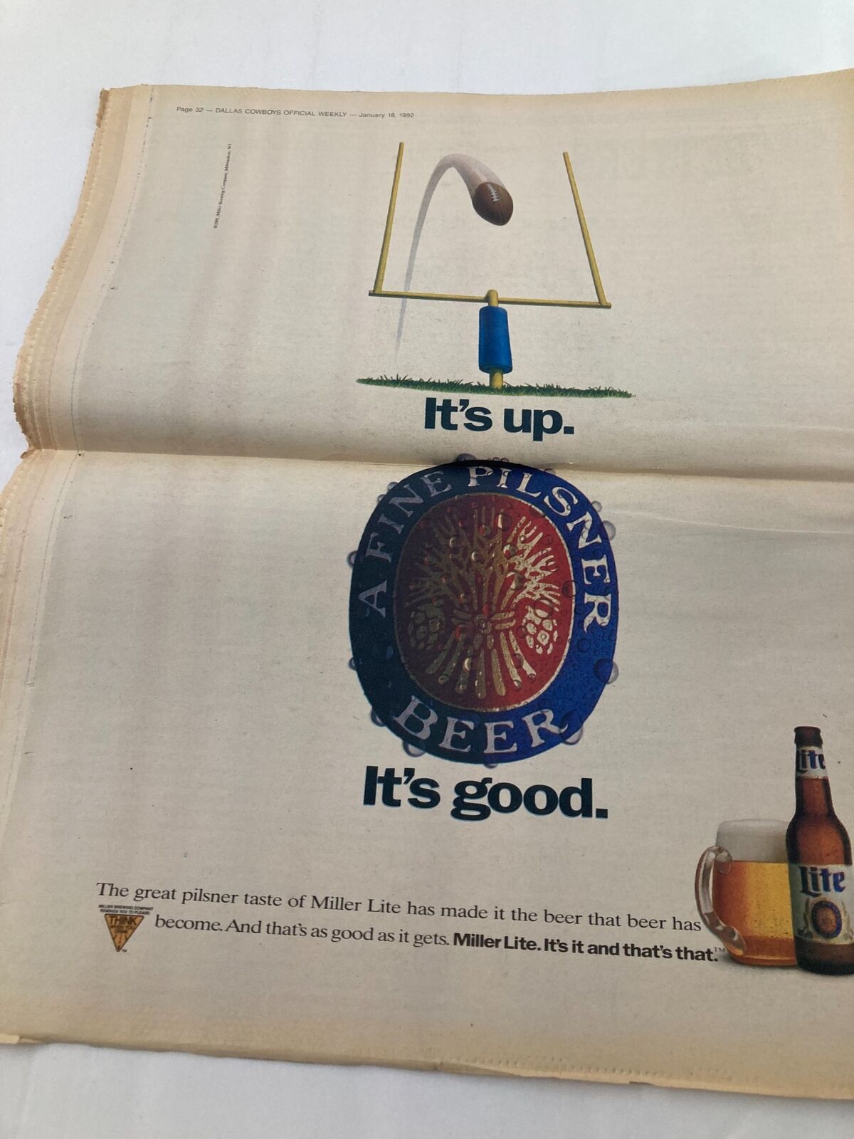 Advertisement page from the Dallas Cowboys Weekly Newspaper January 18 1992 Vol 17 #32 featuring a Miller Lite beer ad with a football theme, emphasizing its quality.