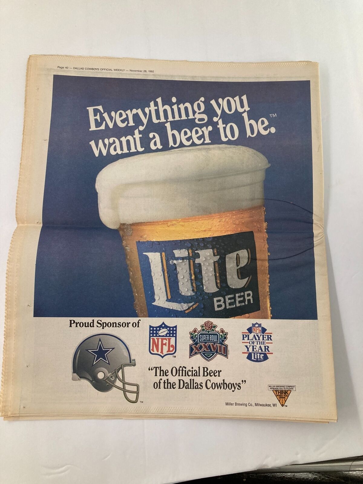 Image from Dallas Cowboys Weekly Newspaper November 28 1992 Vol 18 #24 showing an advertisement for Lite Beer, highlighting its sponsorship of the Dallas Cowboys.